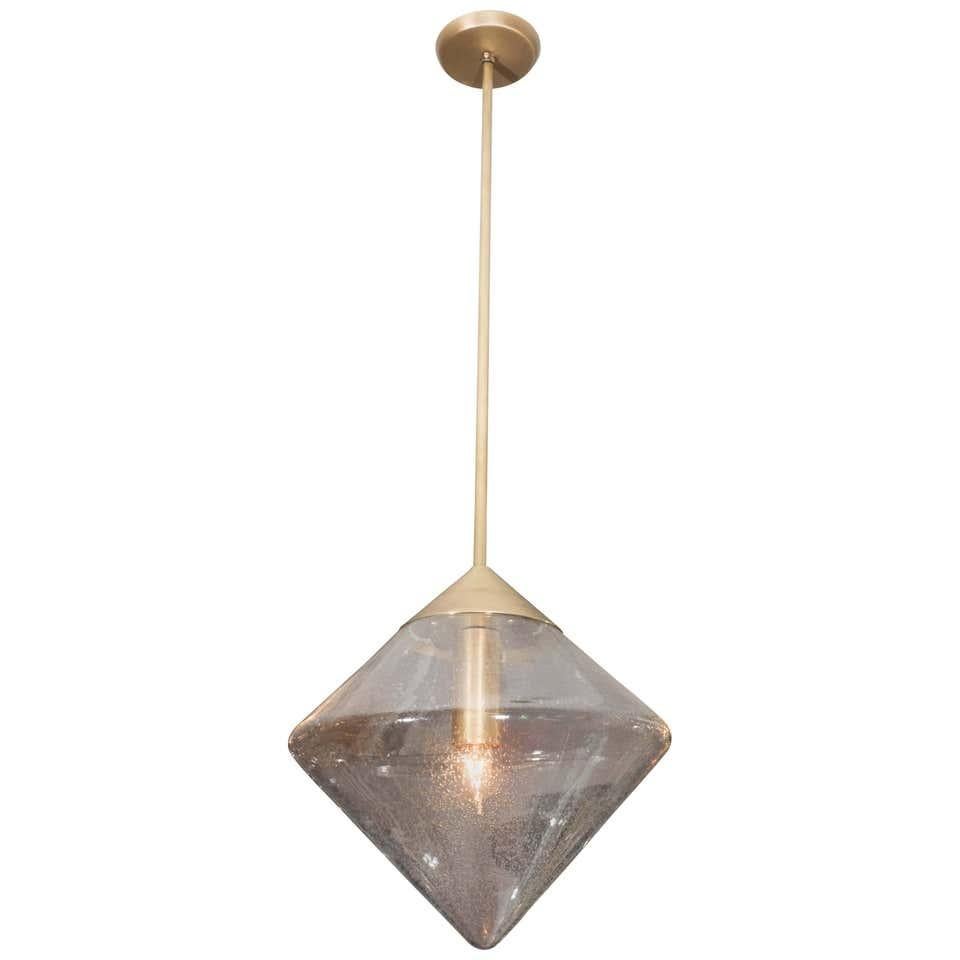 Pendant with prism globe. Customization is available in different finishes. Please provide overall height you need to place an order.