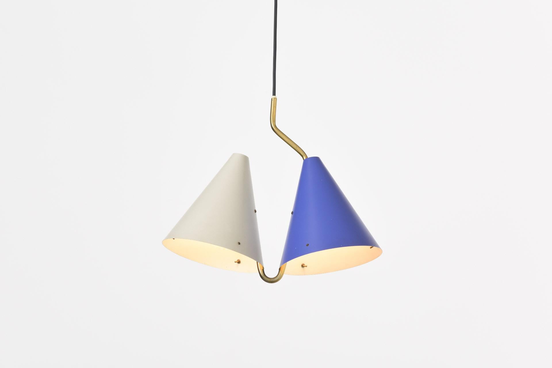 1950s pendant with two lampshades and brass suspension. Design by Svend Aage Holm Sørensen for Lyfa. Made in Denmark.