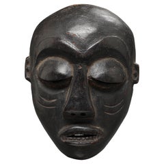 Pende or Kwese Black Wood Small Mask Heavy Eyelids Teeth, DRC Congo Africa