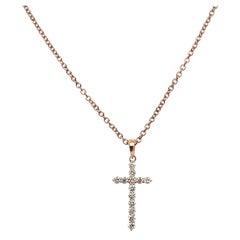 Collier en forme de croix pendentif en or rose et diamants 