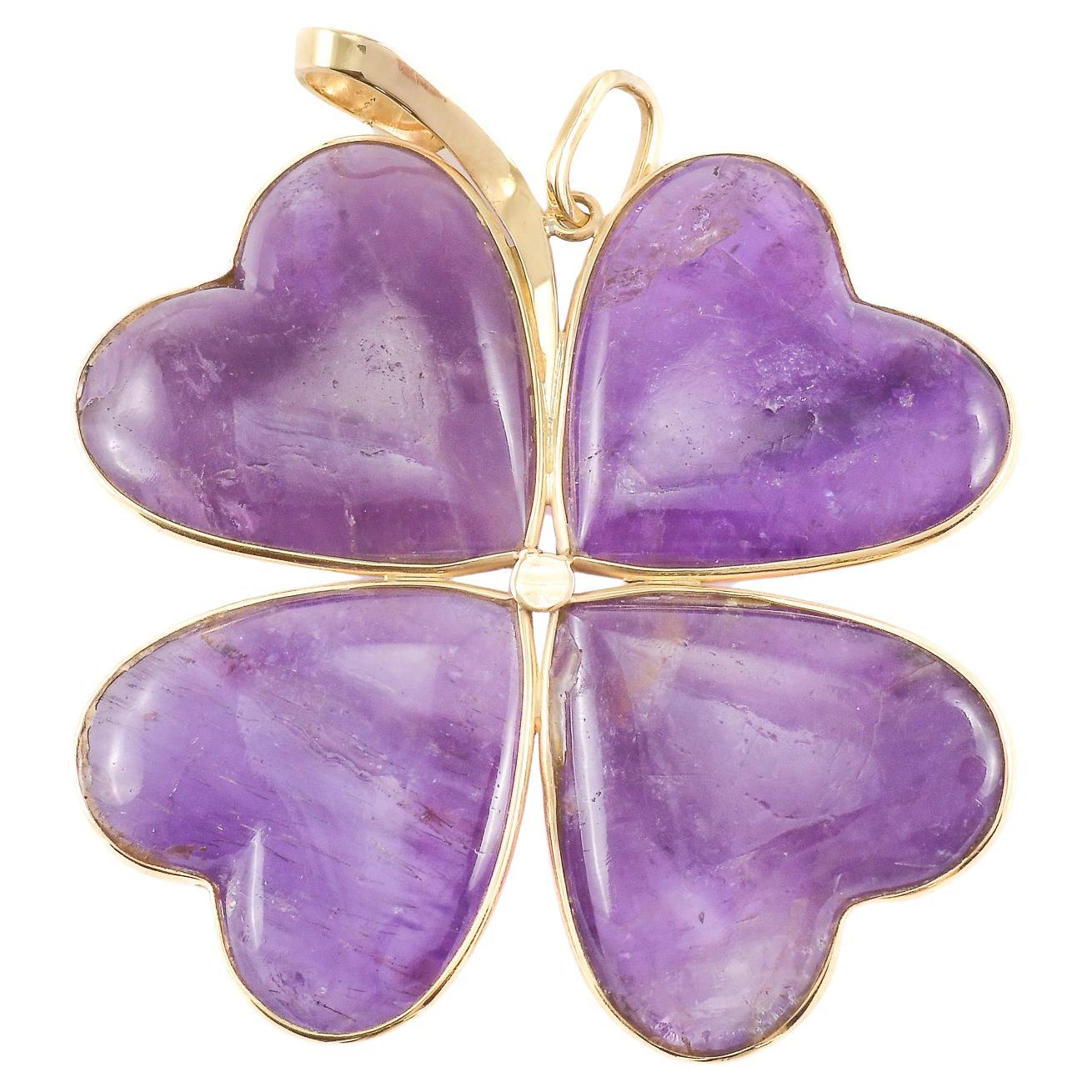Pendentif trèfle en or avec améthystes en vente