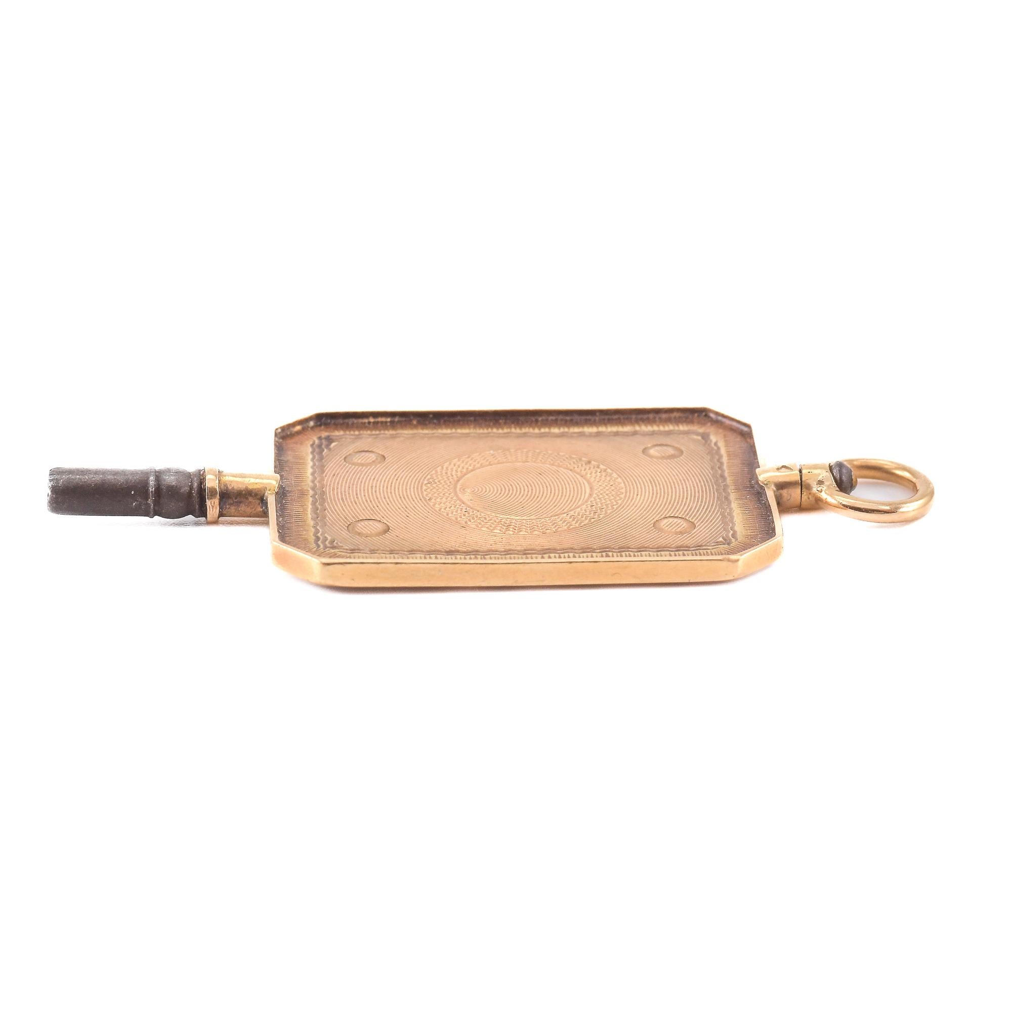 Pendente in oro con chiave da orologio in vendita 8