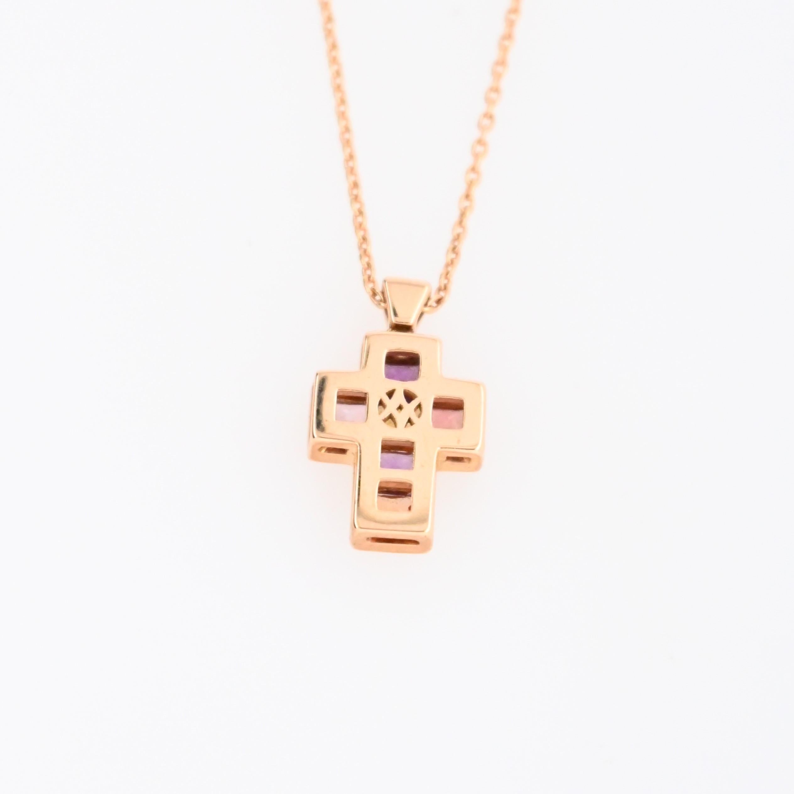 Discover this magnificent cross pendant necklace, a piece that combines elegance and spirituality. This necklace is adorned with an incredibly beautiful cross, highlighting the harmonious combination of multicolored sapphires and sparkling