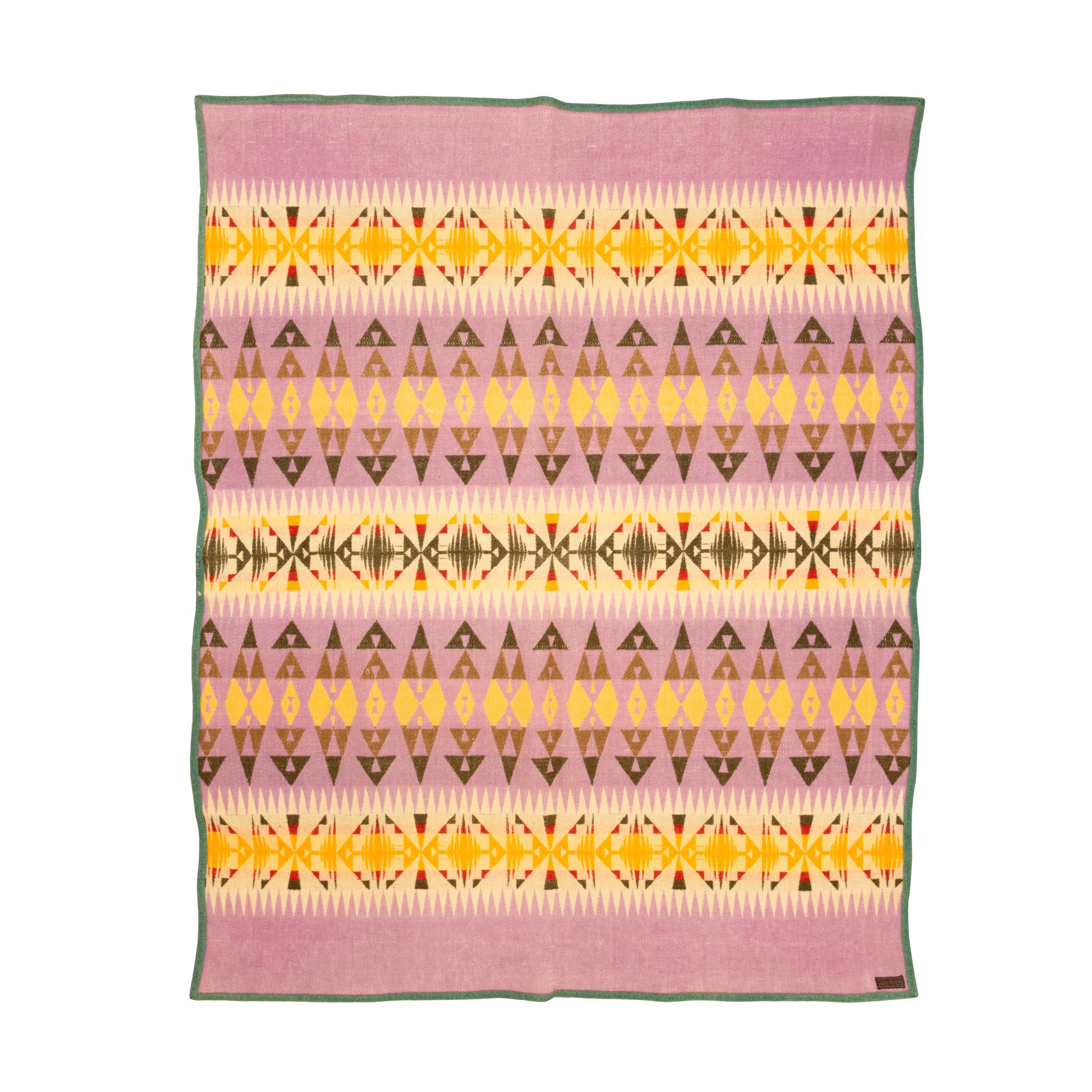 Pendleton Cayuse Indian wool trade blanket with edged binding and label. Featuring bold colors of mauve, yellow, orange, and browns in ombre geometric design. Great for a Southwestern home or rustic cabin. Size: 56