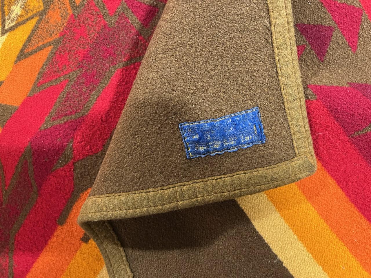 This Pendleton wool Indian design blanket has the original Cayuse label and is in fine condition.The blanket reverses different colors combo.