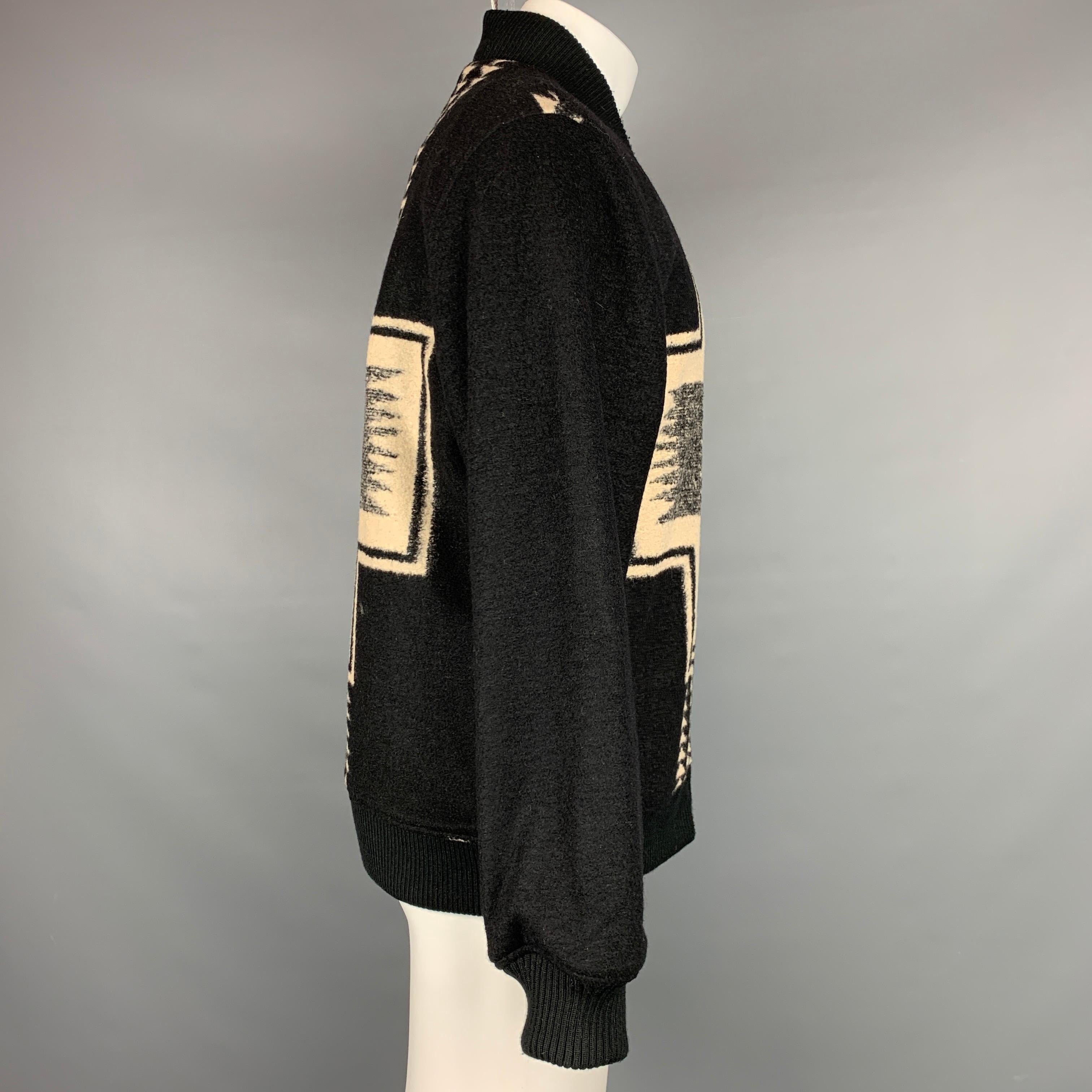 PENDLETON jacket comes in a black & beige woven wool blend featuring a bomber style, ribbed hem, and a zip up closure. 

New With Tags. 
Marked: M

Measurements:

Shoulder: 19 in.
Chest: 44 in.
Sleeve: 25.5 in.
Length: 27.5 in. 