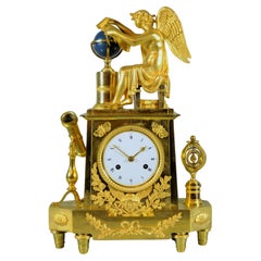 Pendola francese bronzo dorato allegoria Astronomia, astrolabio ormolu. Impero.