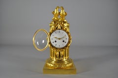 French Louis XVI table clock , gilt bronze column signed Osmond