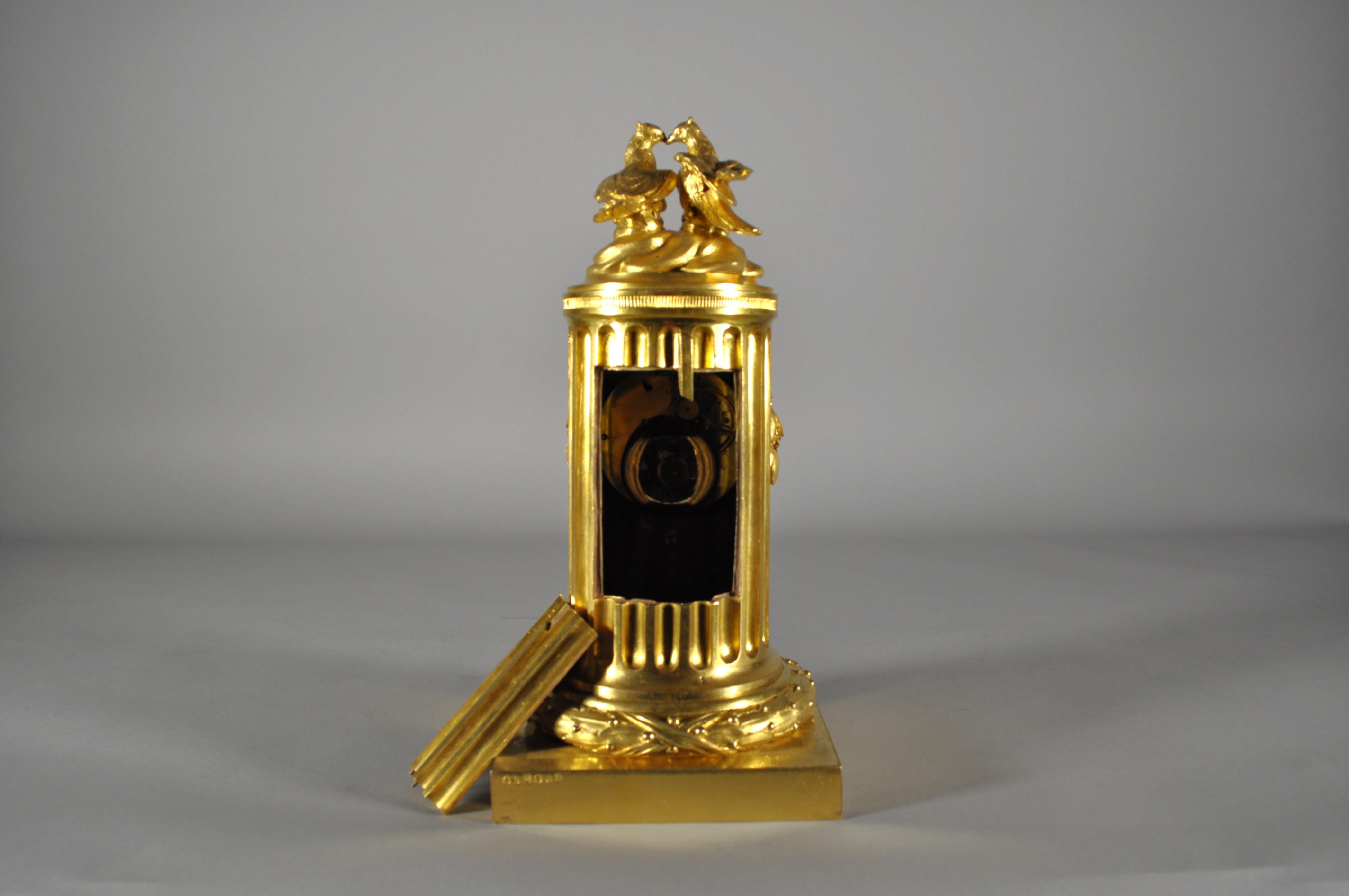 18th Century French Louis XVI table clock , gilt bronze column signed Osmond For Sale