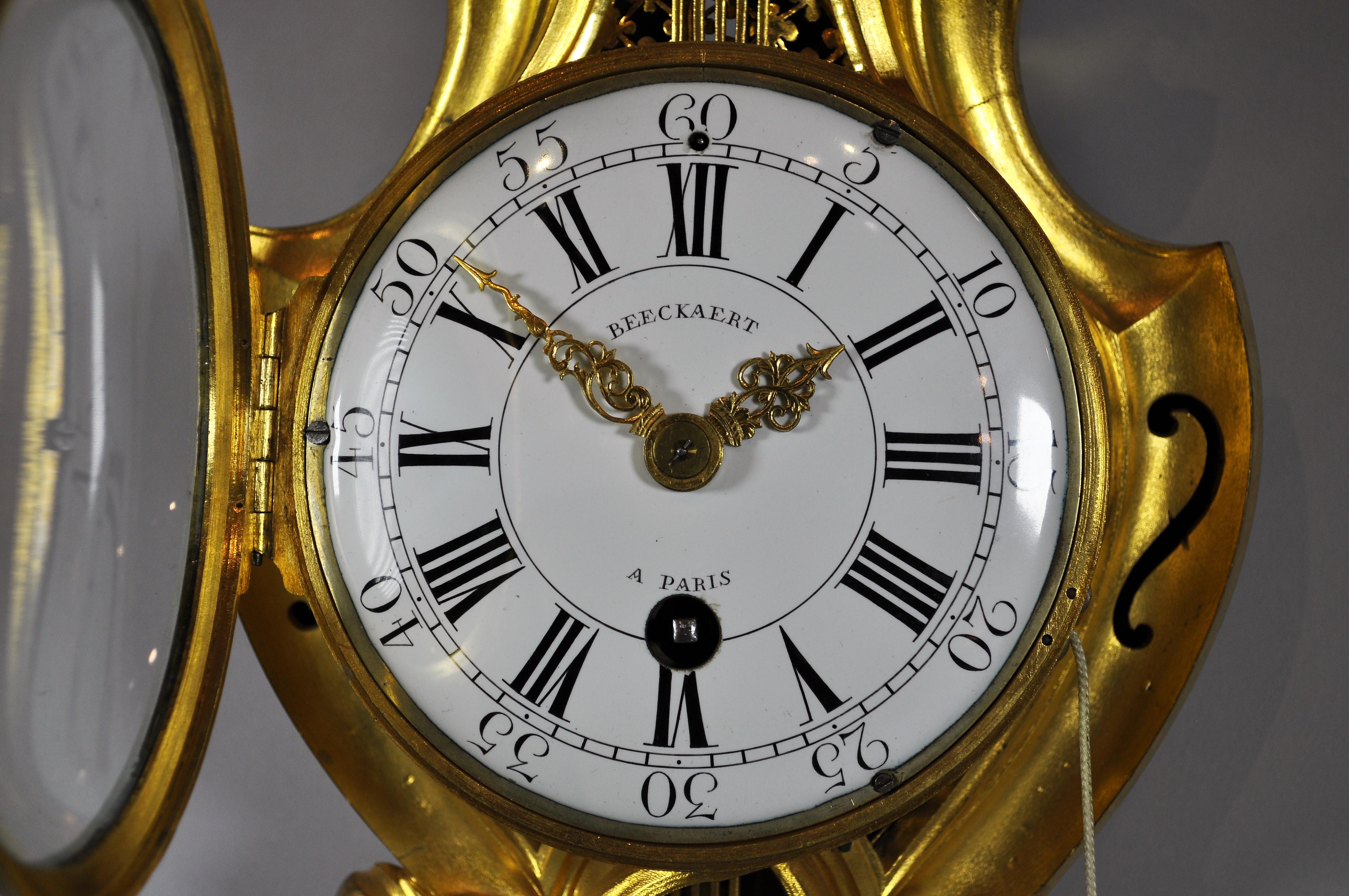 Gilt French Louis XV pendulum clock model cartel d'alcove gilt bronze. BEECKAERT, 1760 For Sale