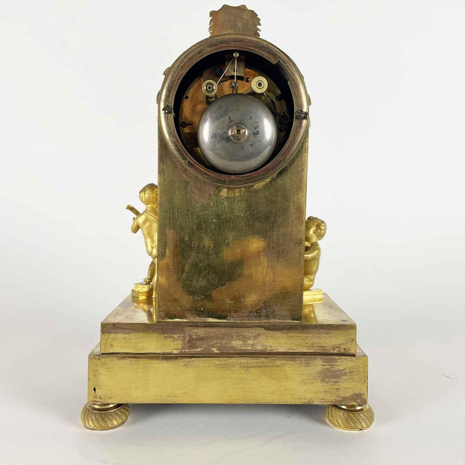 French Empire Pendulum In Gilt Bronze Early 1800s With Putti and Bookcase For Sale 9