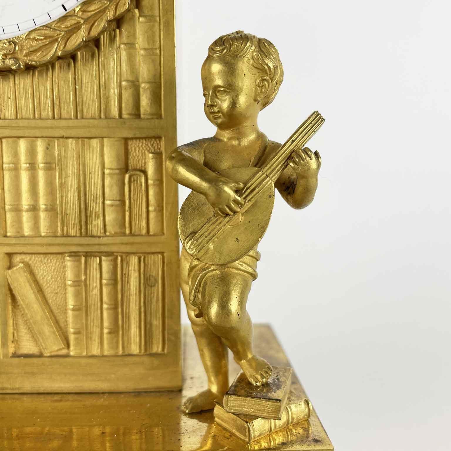 19th Century French Empire Pendulum In Gilt Bronze Early 1800s With Putti and Bookcase For Sale