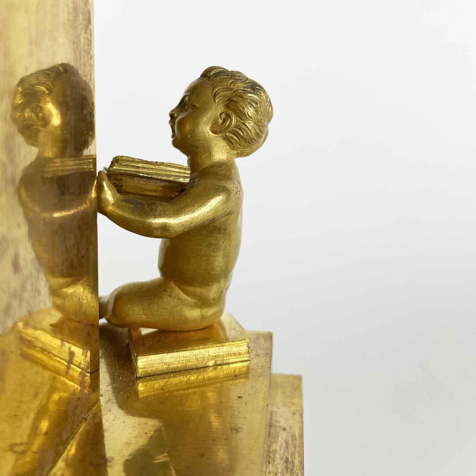 French Empire Pendulum In Gilt Bronze Early 1800s With Putti and Bookcase For Sale 2