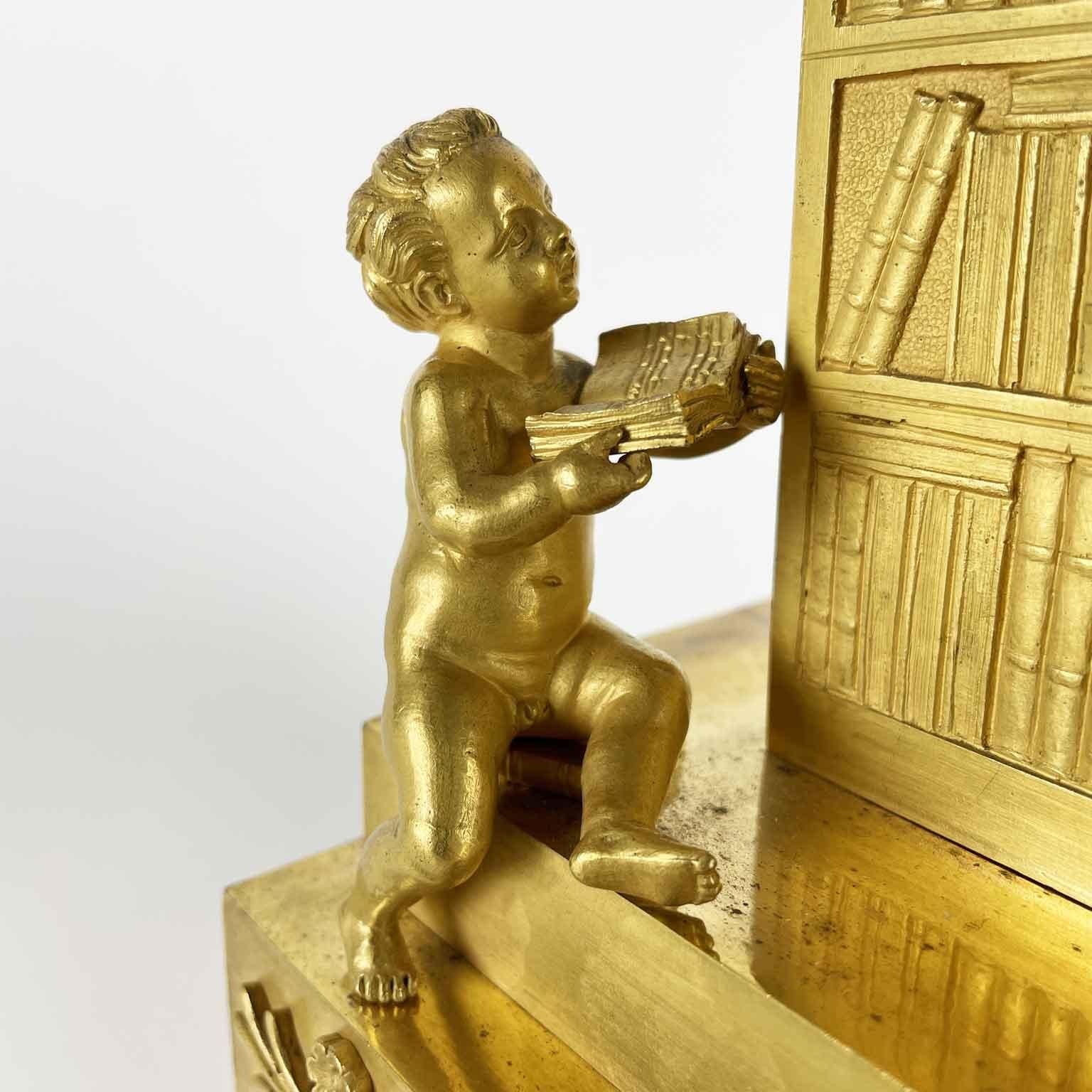 French Empire Pendulum In Gilt Bronze Early 1800s With Putti and Bookcase For Sale 4