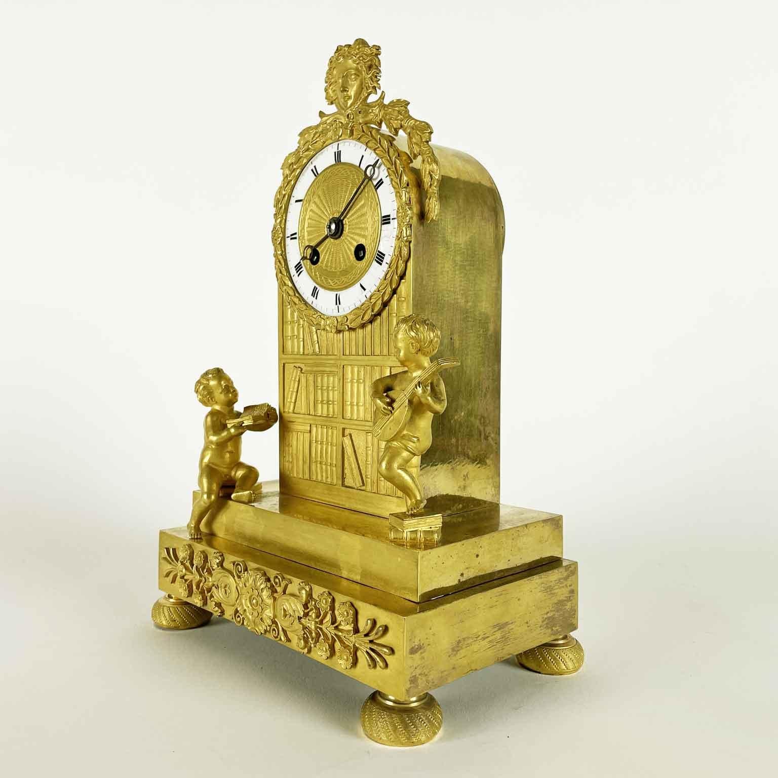 French Empire Pendulum In Gilt Bronze Early 1800s With Putti and Bookcase For Sale 5