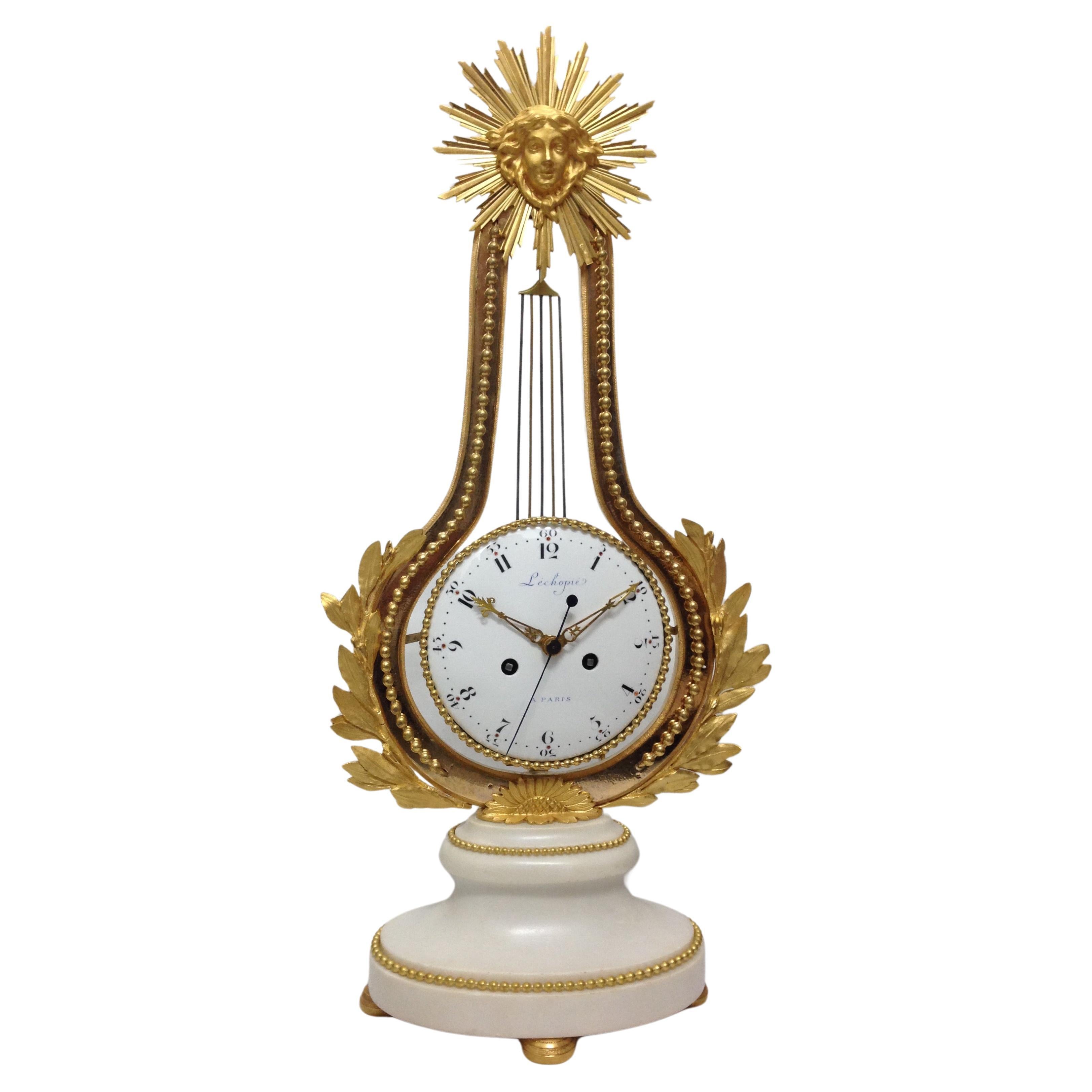 Louis XVI model "swinging lyre" pendulum clock bronze and marble
