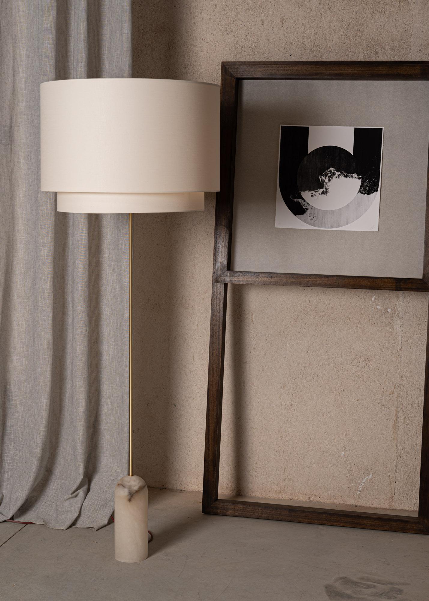 Pendolo Duoblo White Alabaster Floor Lamp by Simone & Marcel
Dimensions: D 60 x W 60 x H 176 cm.
Materials: Brass, cotton and white alabaster.

Also available in different marble and alabaster options and finishes. Custom options available on