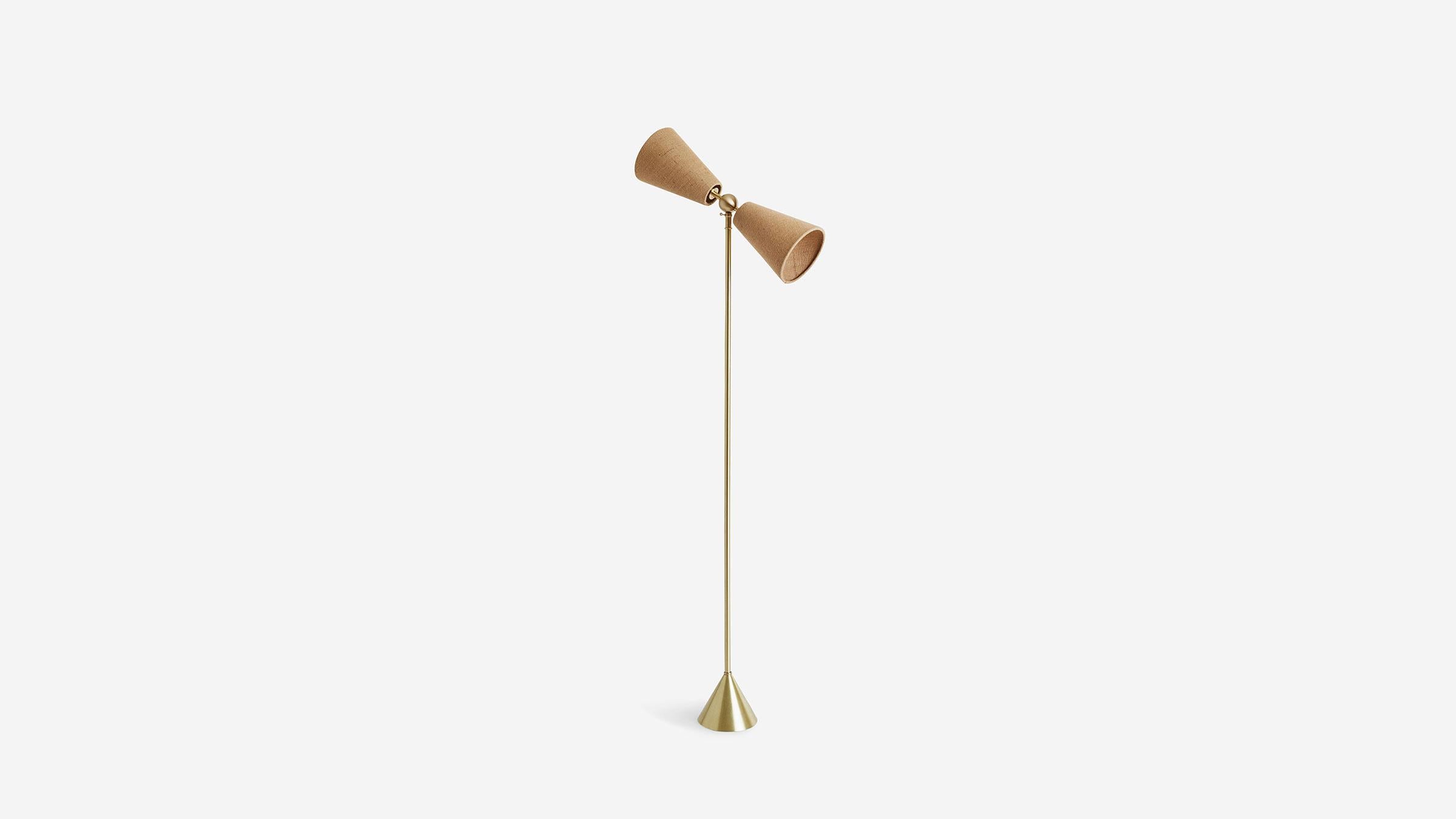 PENDOLO FLOOR LAMP pivots on extended fulcrum to simultaneously cast light in opposite directions. This sturdy floor piece is well poised to mix seamlessly in material while providing a decisive focal point in form. UL, cUL, CE Listed. Damp Rated.
