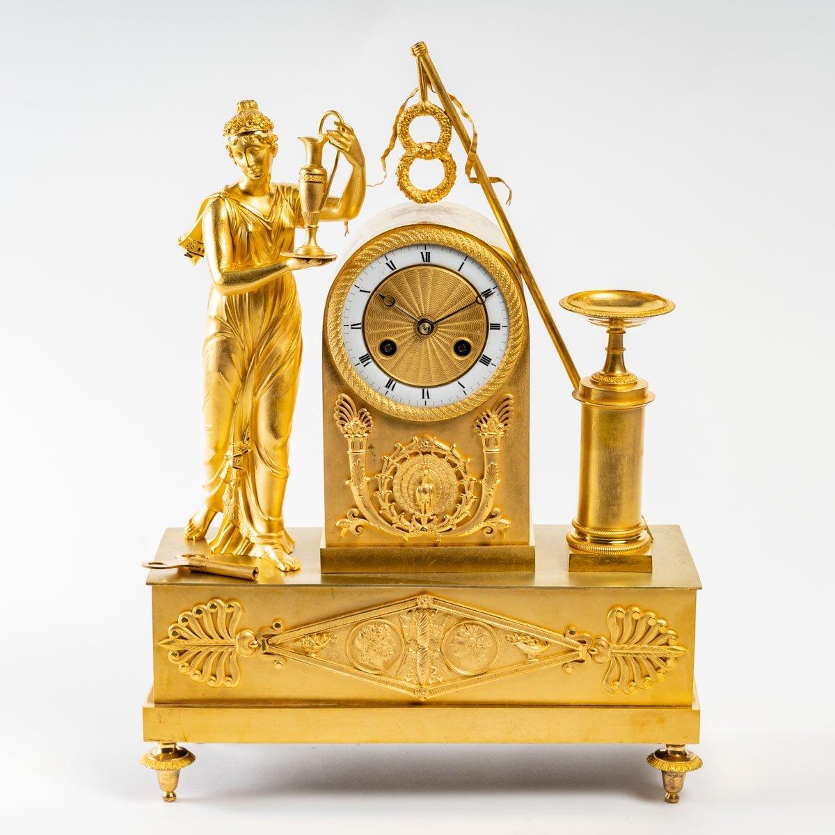 Sublime pendulum in gilded bronze, the mercury gilding is original.
The dial is white enamelled and the hours are written in Roman numerals.

Period: Restoration
Dimensions: Height: 48.5cm x Length: 34.5cm x Depth: 12.5cm
Original mechanism