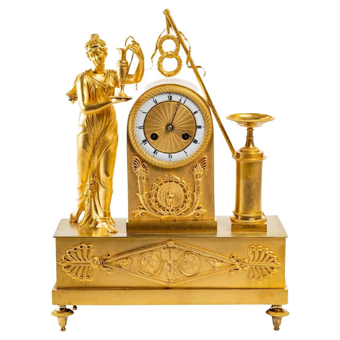 Pendulum aus vergoldeter Bronze – Allegorie der Göttin Hera – Restaurierung