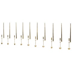 "Pendulum" Brass Wall Mounted Candlesticks by Pierre Forssell, Set of 10