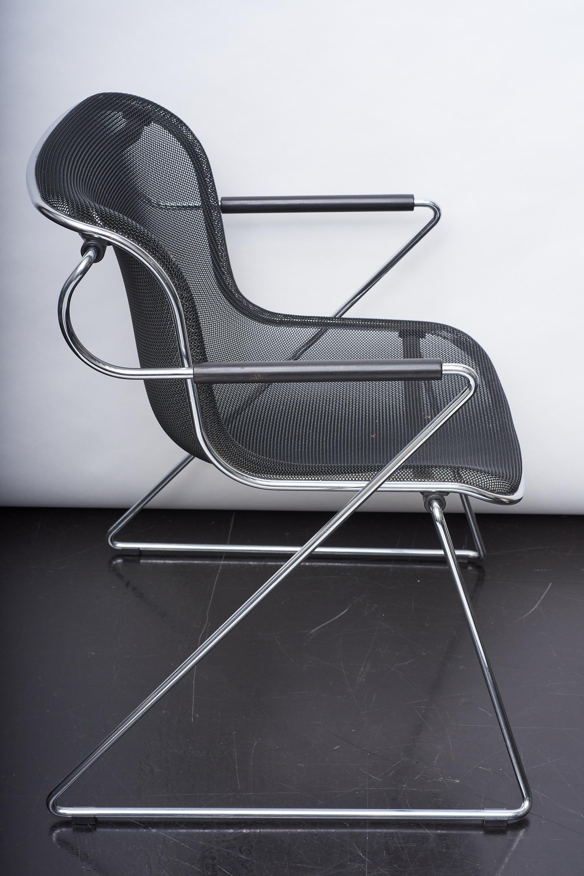 Penelope chair designed in 1982 by Charles Pollock for Anonima Castelli. Steel-wire sled base supports a seat permeable to air which consists in a steel-wire fence coated with synthetic resin. Very good condition!