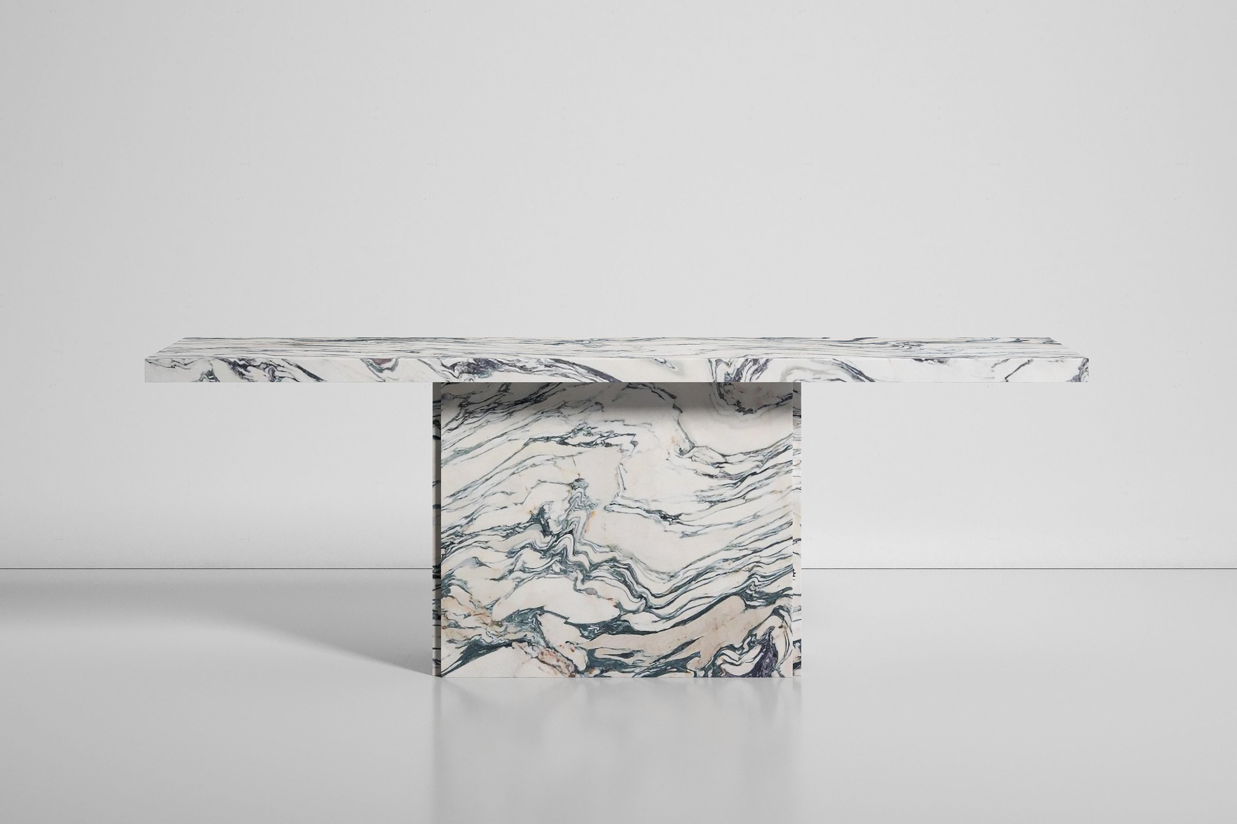 Penelope is a console table that exudes luxury and sophistication. Made from the rare Cipollino marble, each piece is unique and one-of-a-kind and a true treasure for your home. The exquisite natural veining of the marble creates an extraordinary
