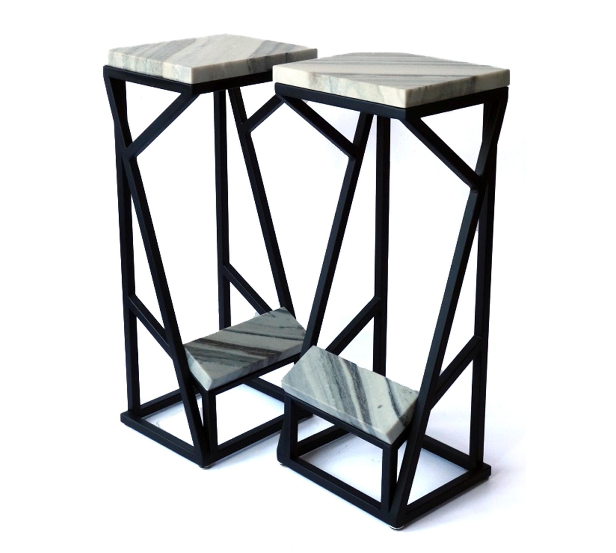 Meticulously hand-crafted, this striking piece features a powder coated steel frame, Carrara marble seat and footrest.  Seamlessly blending function with art,  Its design draws inspiration from the graceful silhouette of a penguin, creating a