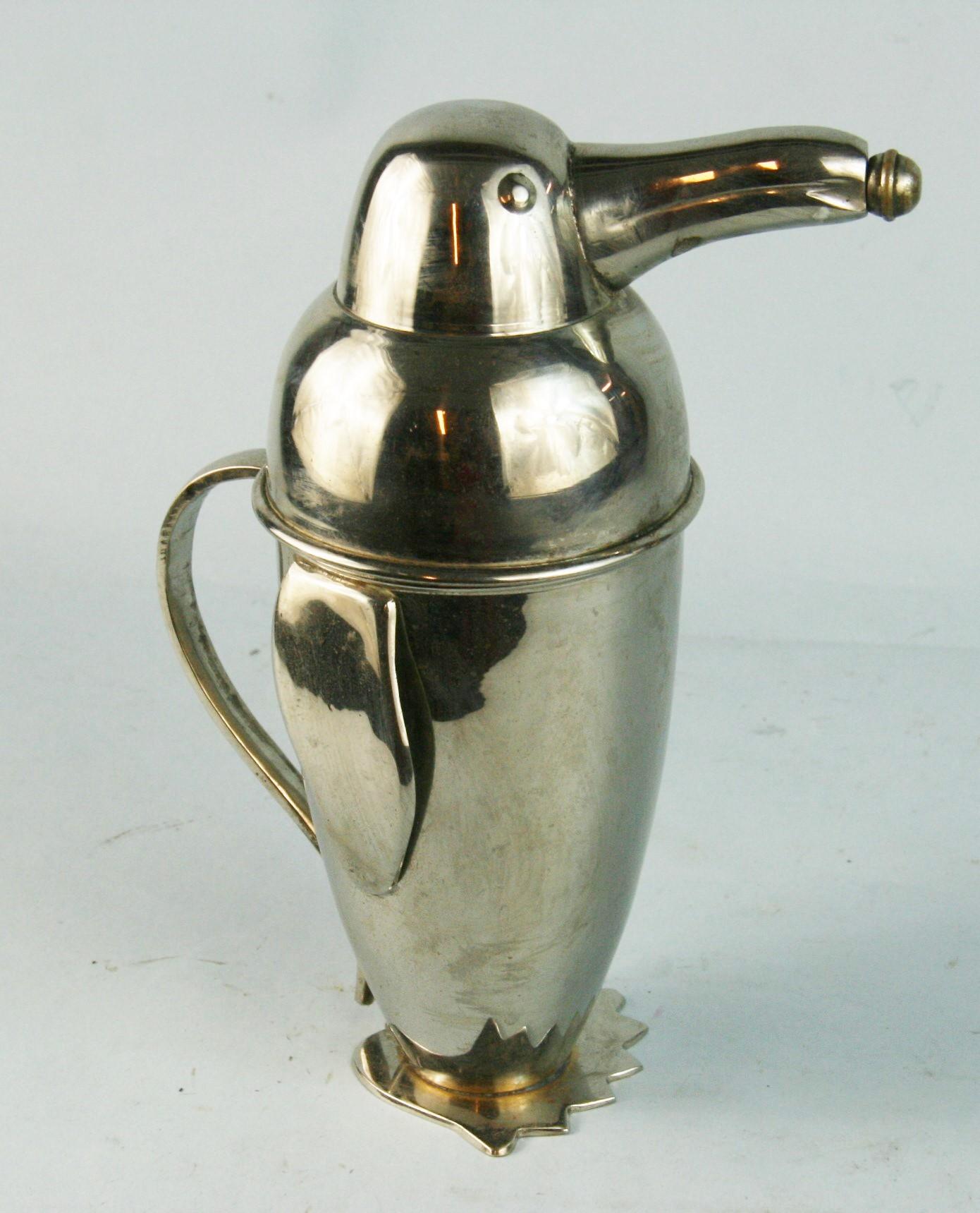 3-769 Silvered brass penguin cocktail shaker circa 1936.