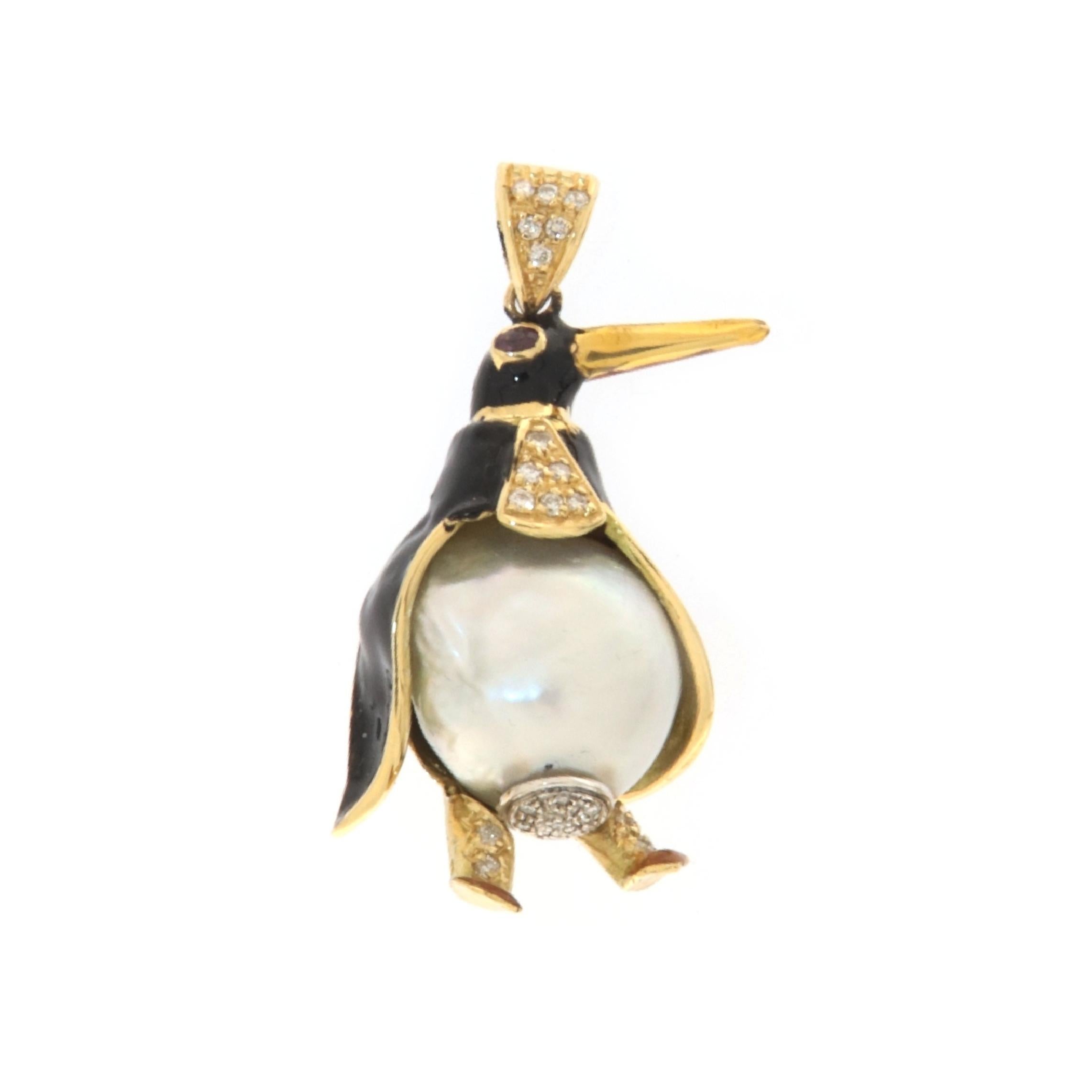 This charming penguin-shaped pendant, crafted in 18-karat yellow gold, is a celebration of craftsmanship and uniqueness. With its figure enameled in black through the refined technique of fire enamel, this jewel captures the playful essence and