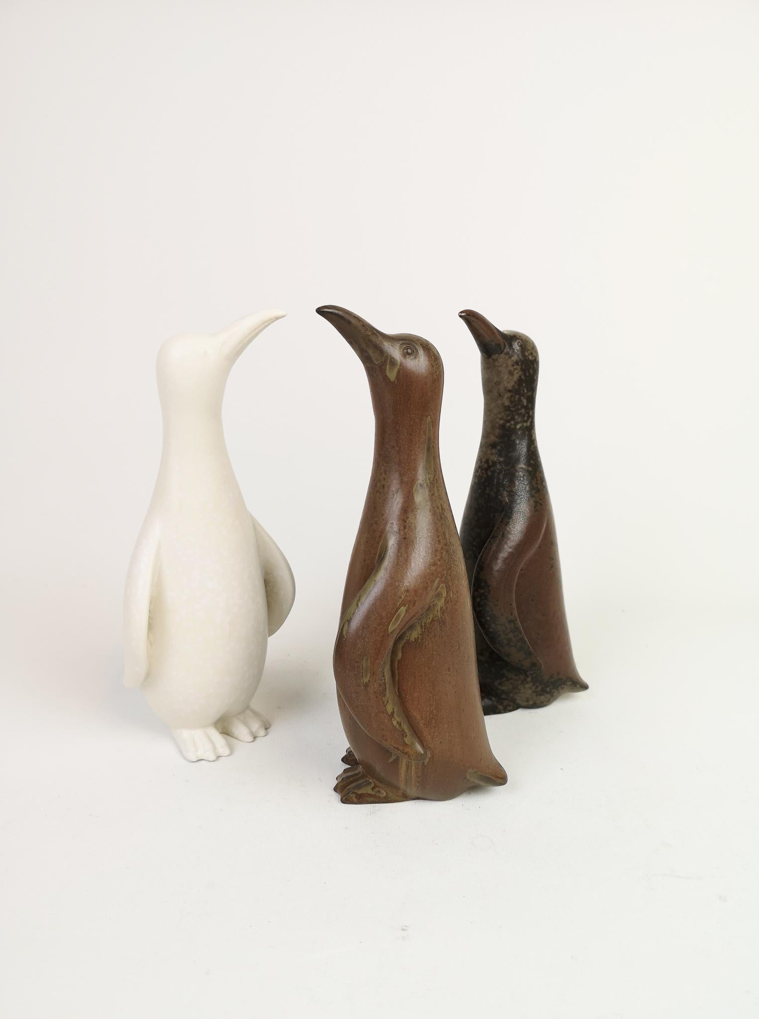 This set is 3 pieces of ceramic penguins from Rörstrand and maker/Designer Gunnar Nylund. Made in Sweden in the midcentury. Beautiful glazed and in good condition. All of them are the large version of the penguins.

Measures: H 22 cm, W 9 cm.

 