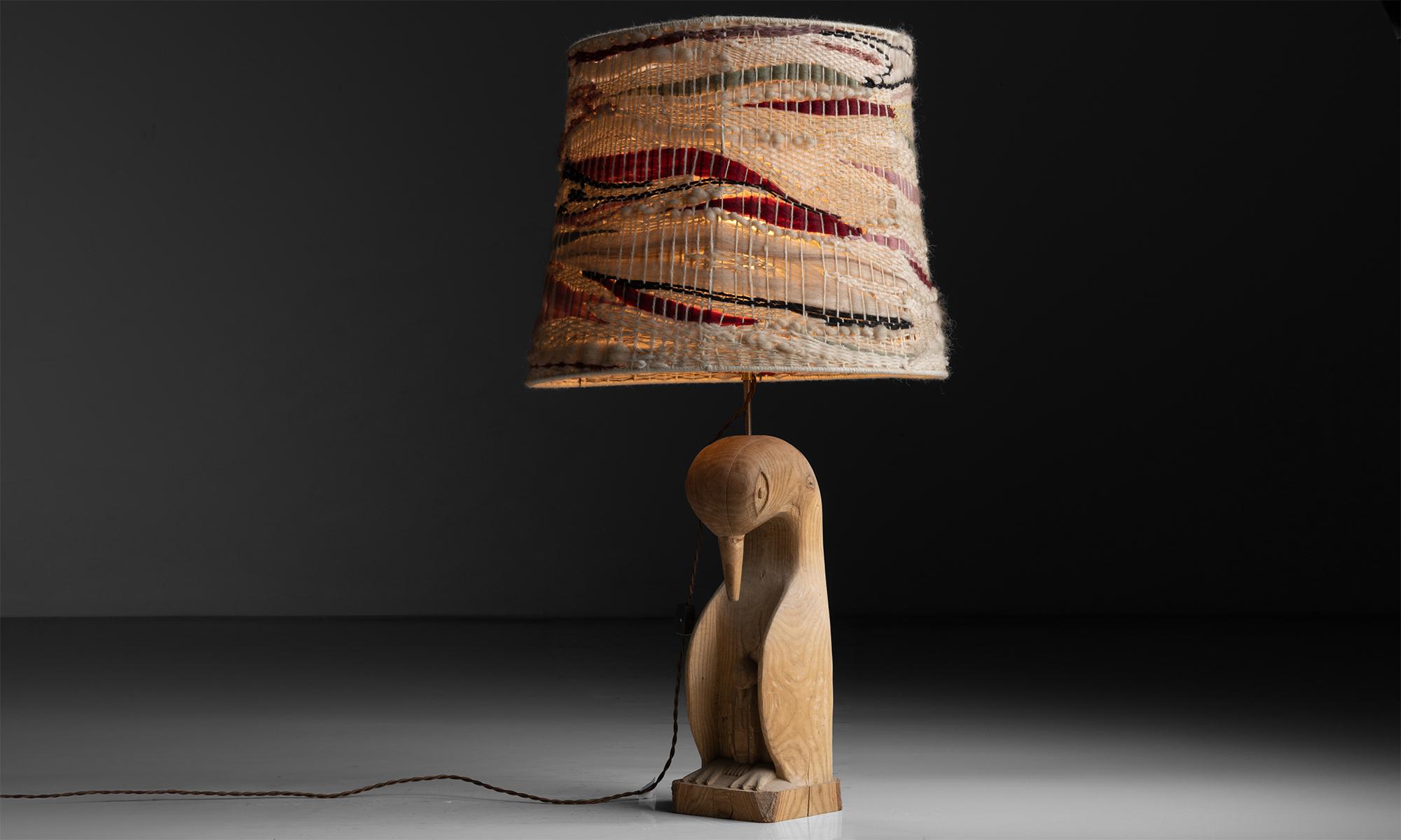 Penguin Lamp

France circa 1970

Carved wooden base, with embroidered yarn and linen shade

19.5”dia x 37”h