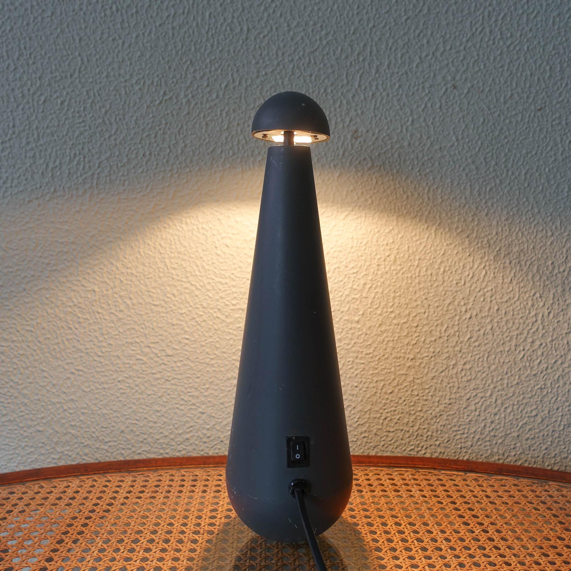 The Penguin table lamp was designed and produced by Massive, in Belgium, during the 1990's. It is a different lamp because it wobbles on its foot if you push it. The shape of the lamp is a penguin and features an halogen lamp. The lamp is in good