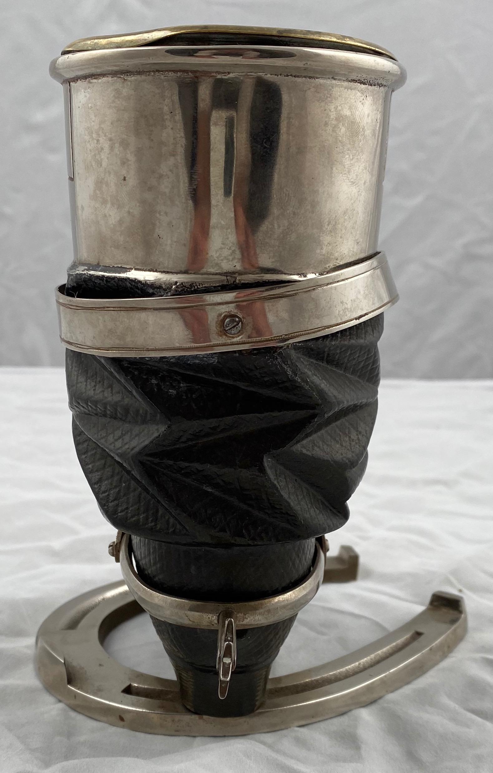 A small wonderful penholder. Made of bronze and steel, late 19th century. The casted boot is standing on a horseshoe and is of absolute top quality.