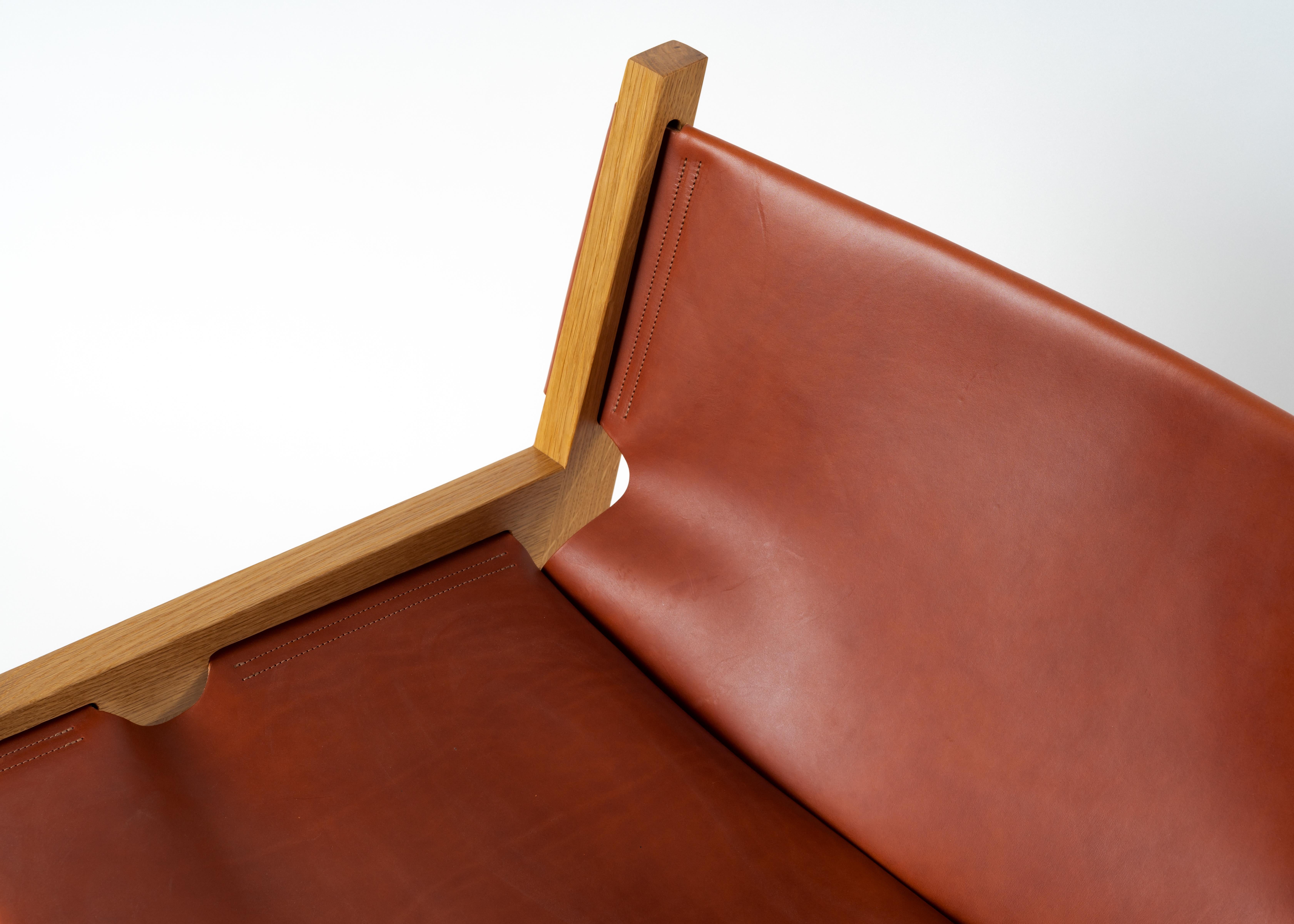 Joinery Peninsula Lounge Chair,  Modern Wood and Leather Sling Chair with Brass Details For Sale