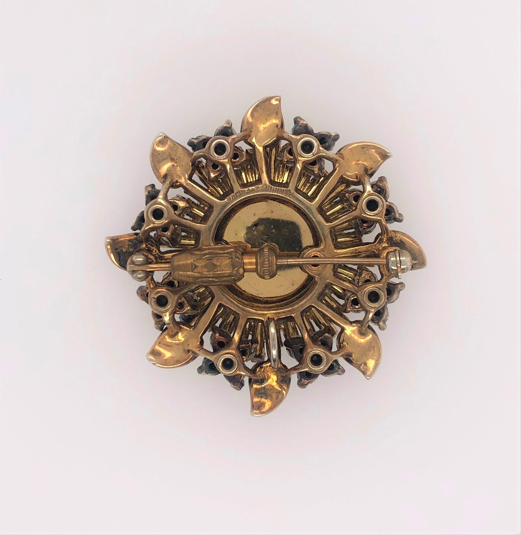 Fabulous vintage floral burst design with a working Pennino Brothers Watch as its center beautifully mixes the sparkle of the quality rhinestones and the gold tone of the vermeil petals on this vintage mid-century brooch pin pendant by the well