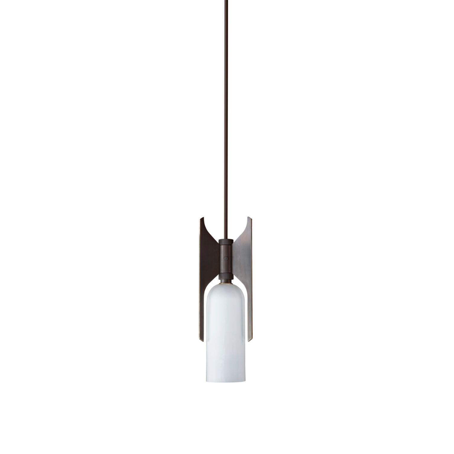 Pennon pendant light - bronze by Bert Frank
Dimensions: 42 (only lamp) x 13.9 x 15.7 cm
Materials: Bronze, bone China

When Adam Yeats and Robbie Llewellyn founded Bert Frank in 2013 it was a meeting of minds and the start of a collaborative