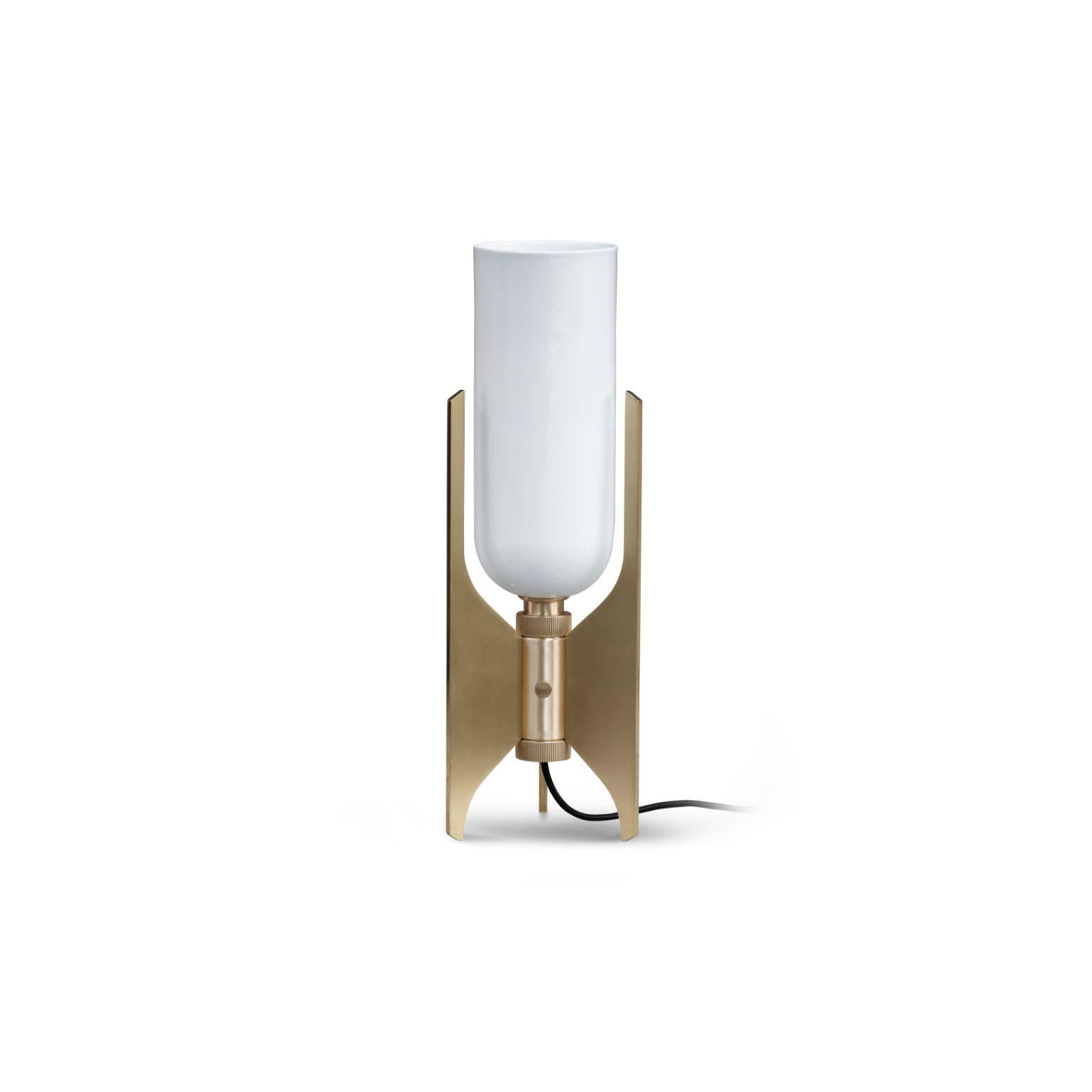 Pennon table lamp - brass by Bert Frank
Dimensions: 42 x 13.9 x 15.7 cm
Materials: Brass, Bone China

When Adam Yeats and Robbie Llewellyn founded Bert Frank in 2013 it was a meeting of minds and the start of a collaborative creative partnership