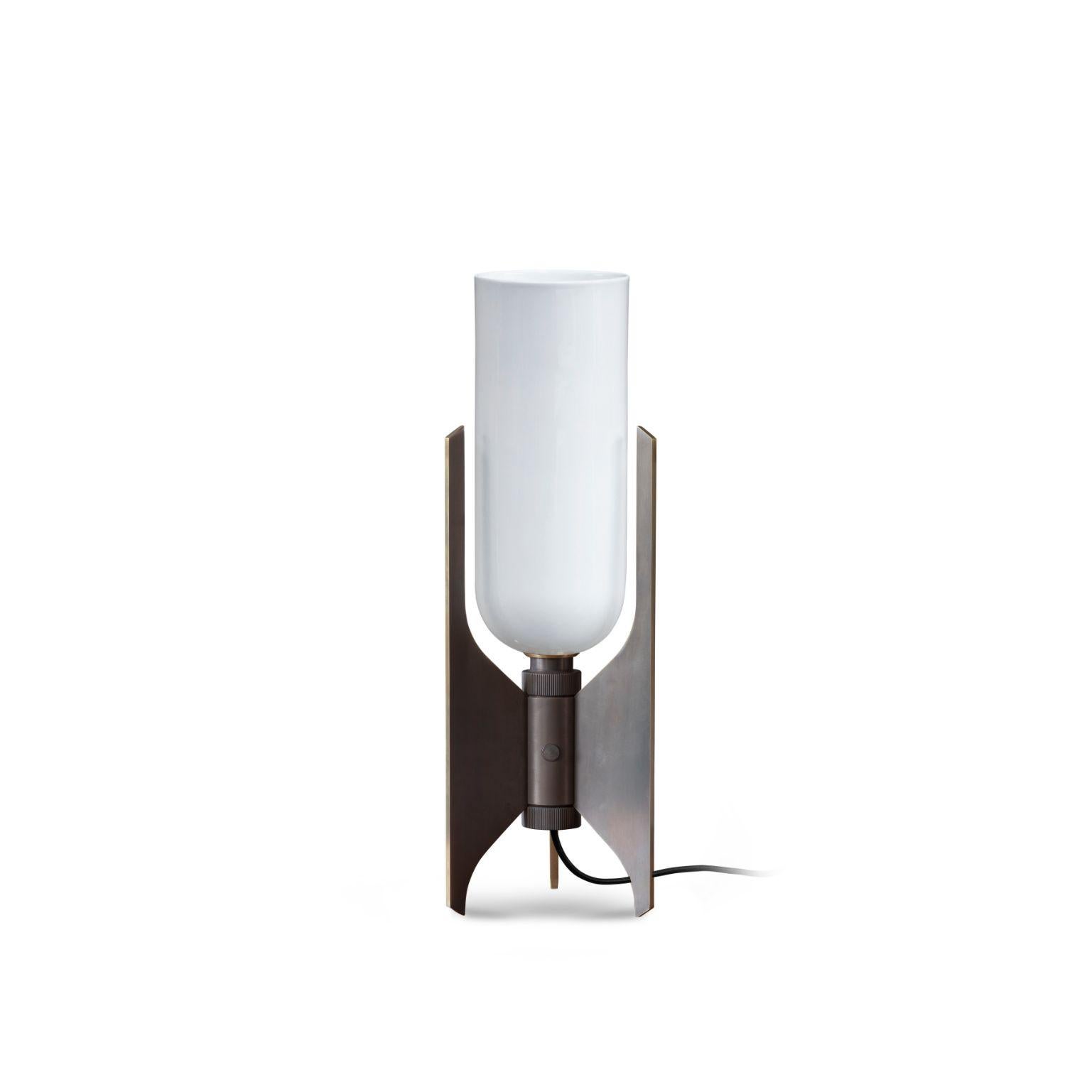 Pennon table lamp - Bronze by Bert Frank
Dimensions: 42 x 13.9 x 15.7 cm
Materials: Bronze, Bone China

When Adam Yeats and Robbie Llewellyn founded Bert Frank in 2013 it was a meeting of minds and the start of a collaborative creative partnership