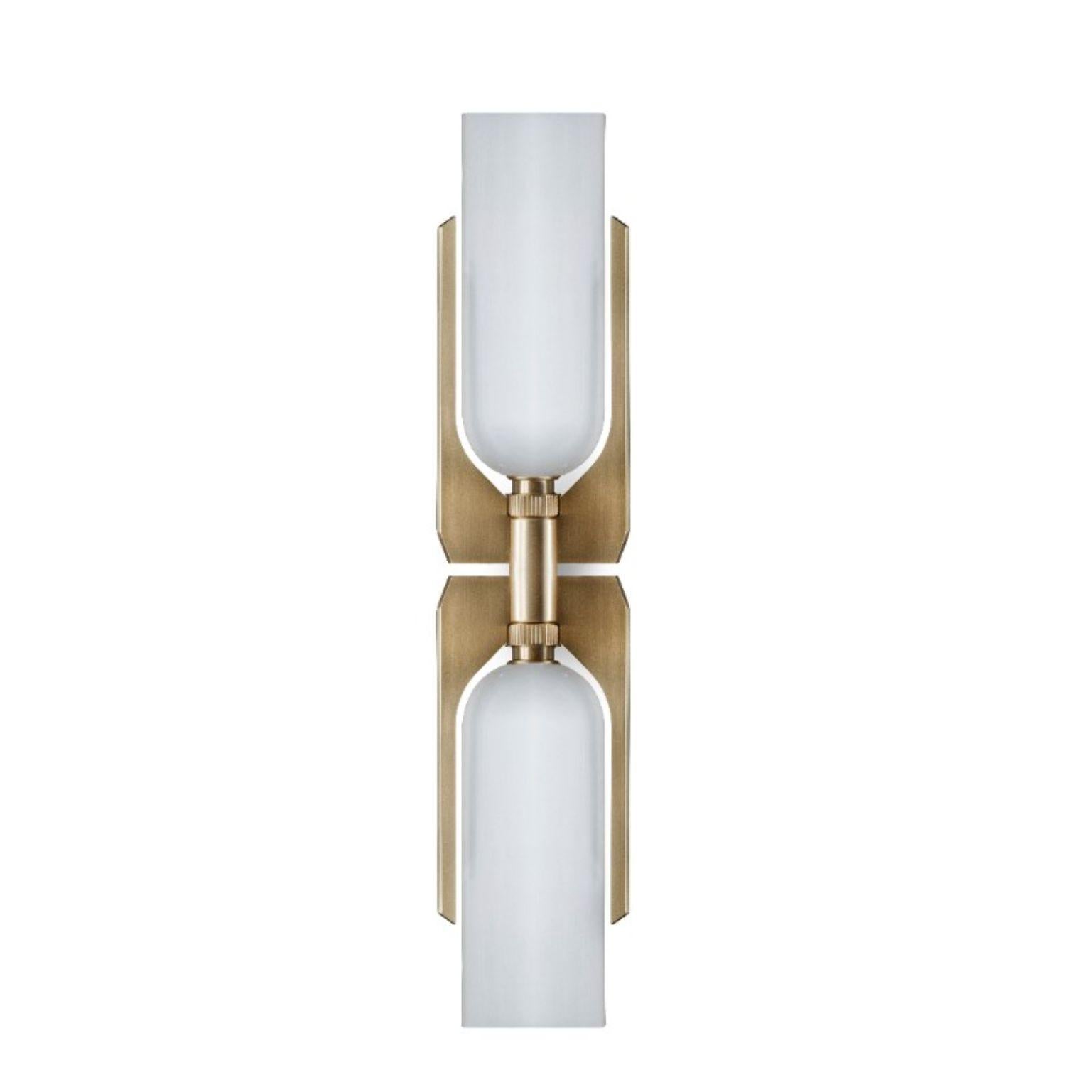 Pennon wall light - Brass by Bert Frank
Dimensions: 62.6 x 13.4 x 6 cm
Materials: Brass, Bone China

When Adam Yeats and Robbie Llewellyn founded Bert Frank in 2013 it was a meeting of minds and the start of a collaborative creative partnership with