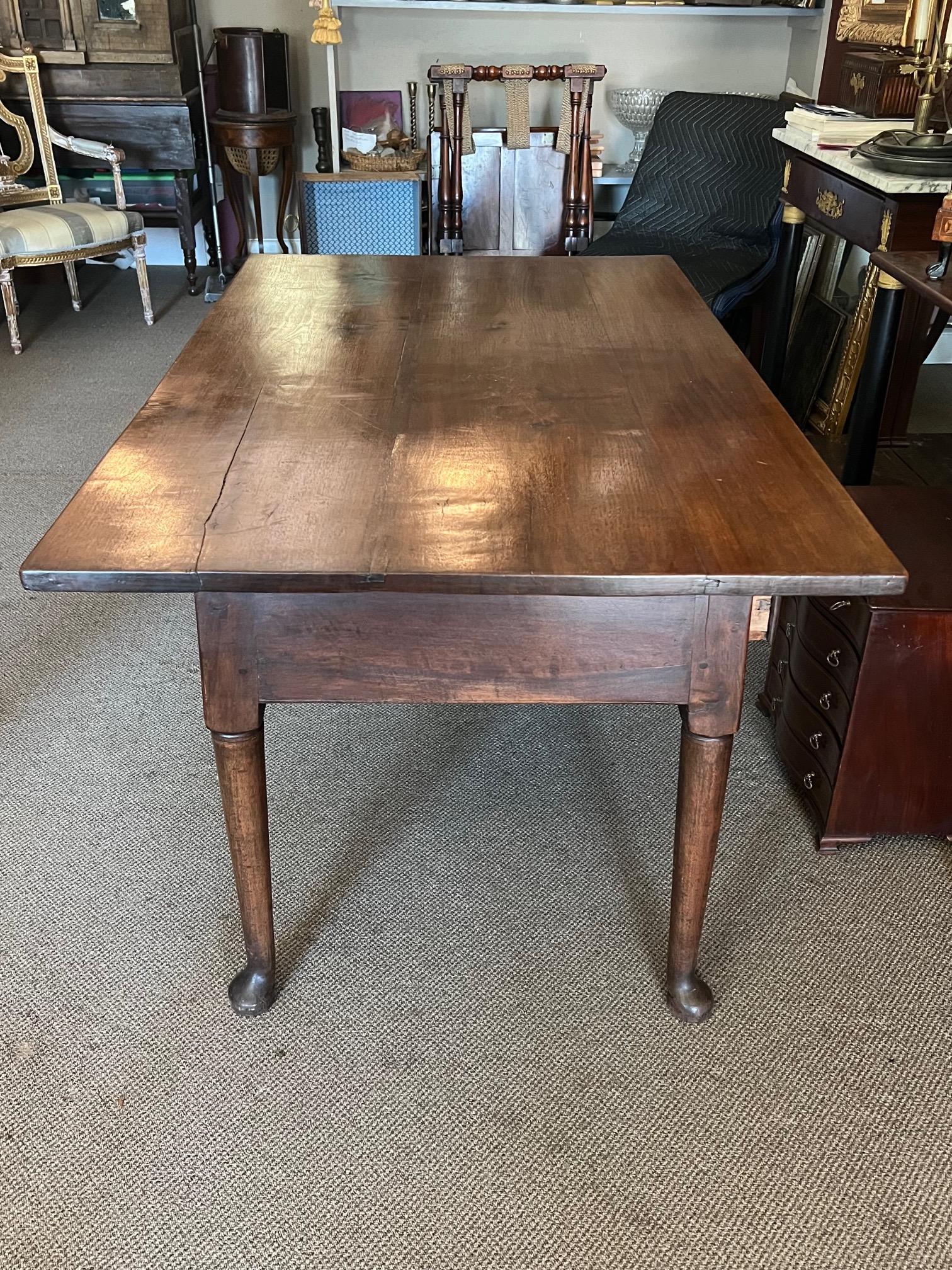 A really special and honest Pennsylvania Dutch (Doylstown) work table ca' 1740-1760. Walnut with pin top, the table has a beautiful patina and nice graining. Heavy and very sturdy-can be used in so many ways-work table/libriary or serving etc.