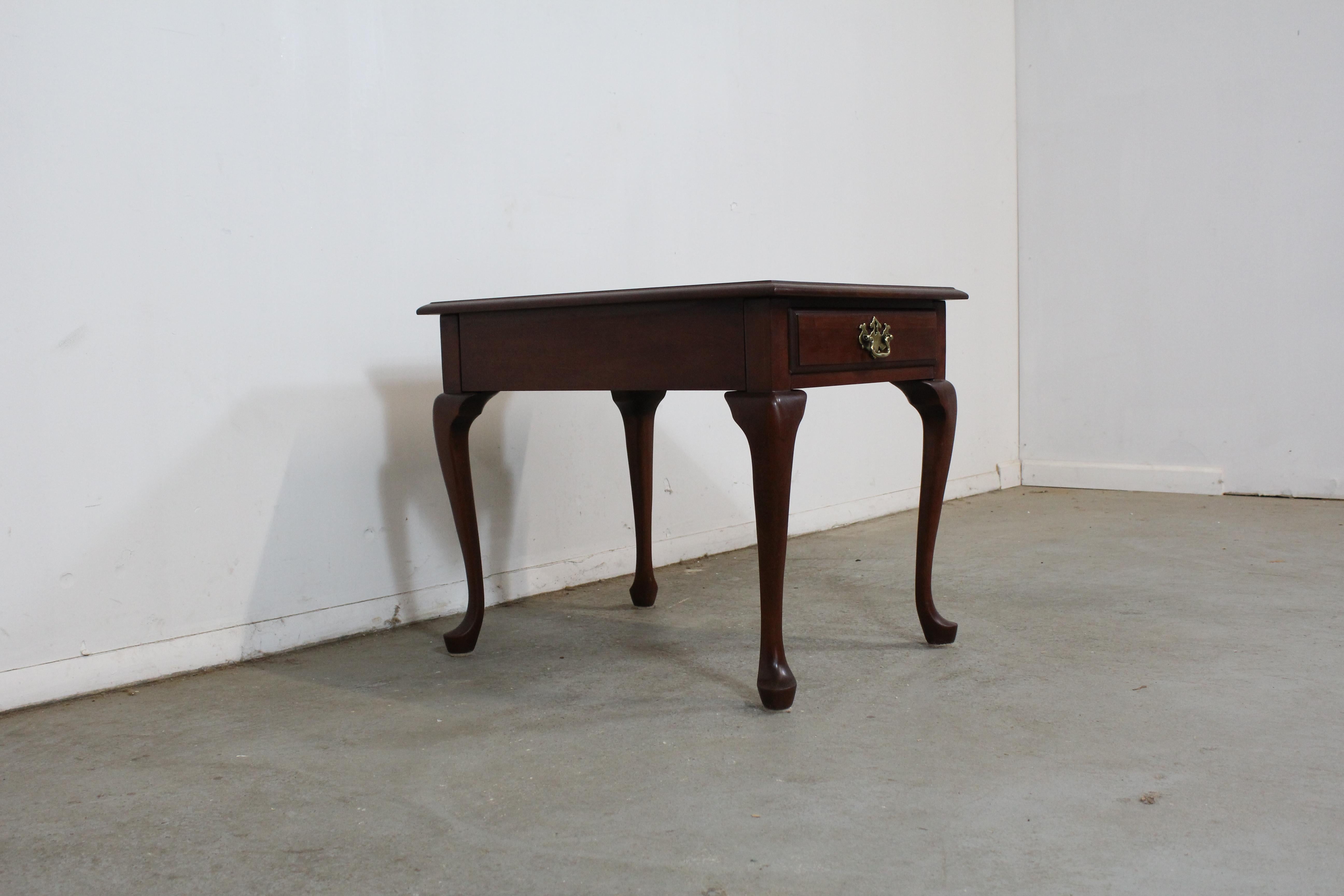 Pennsylvania House Cherry Queen Anne end table with drawer

Offered is a cherry Queen Anne end table. Within the drawer, it is signed by Pennsylvania House. The table shows some scratches and age wear. It's made of solid cherrywood. Please message