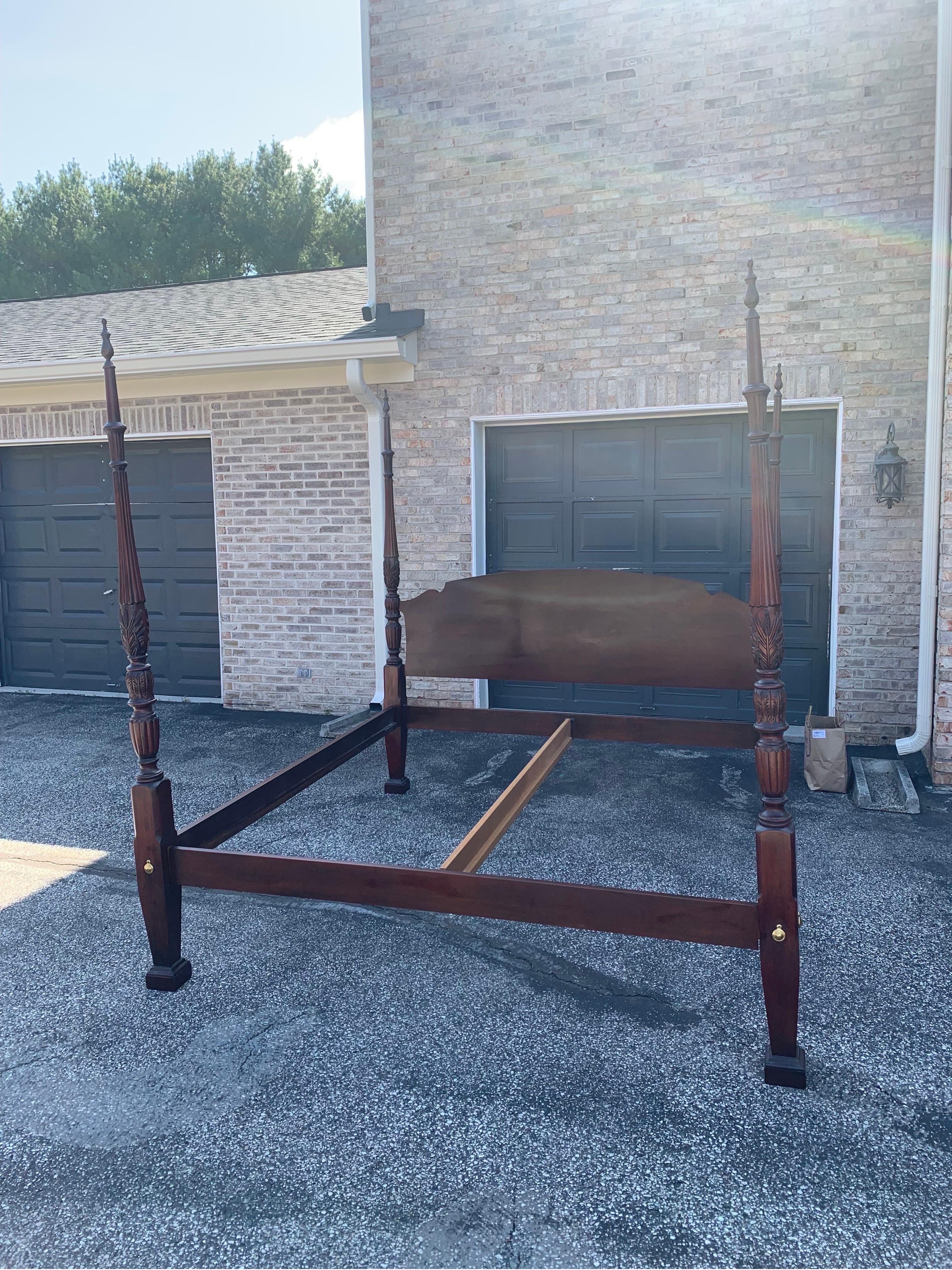 A king size rice bed in solid Mahogany by Pennsylvania House. 

The Bedframe measures 82