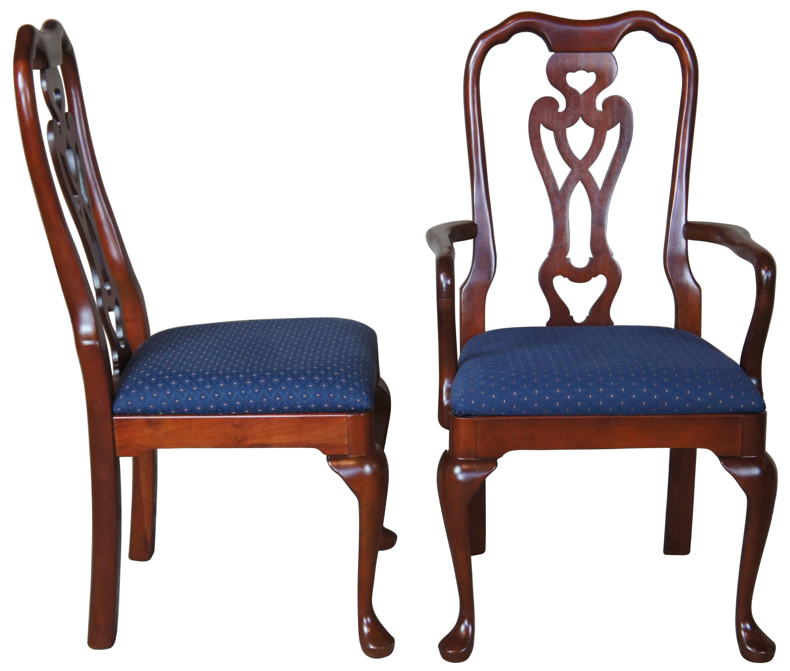 Eight Pennsyvania House dining room chairs. Queen Anne styling with blue seat and cabriole legs. Made from solid cherry. 
 