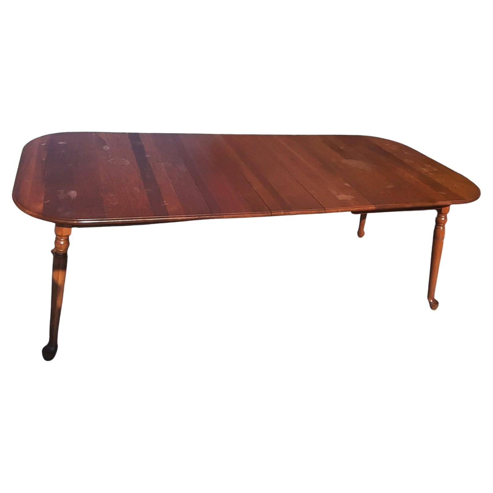 Pennsylvania house solid cherry walter of wabash slides dining table. Comes with 3 leaves of 10 inches each.
Overall dimensions are 90 inches in width, 40 inches in depth and 29.5 inches tall. Table without leaves is 60 inches wide by 40 inches in