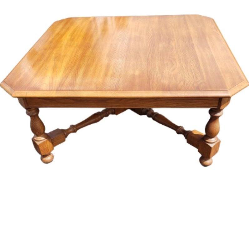 Vintage rock solid Pennsylvania House coffee table in mint condition.
Table measures 36W x 36D x 15H.
Original finish with spindle crossed leg support for extra stability.
 
