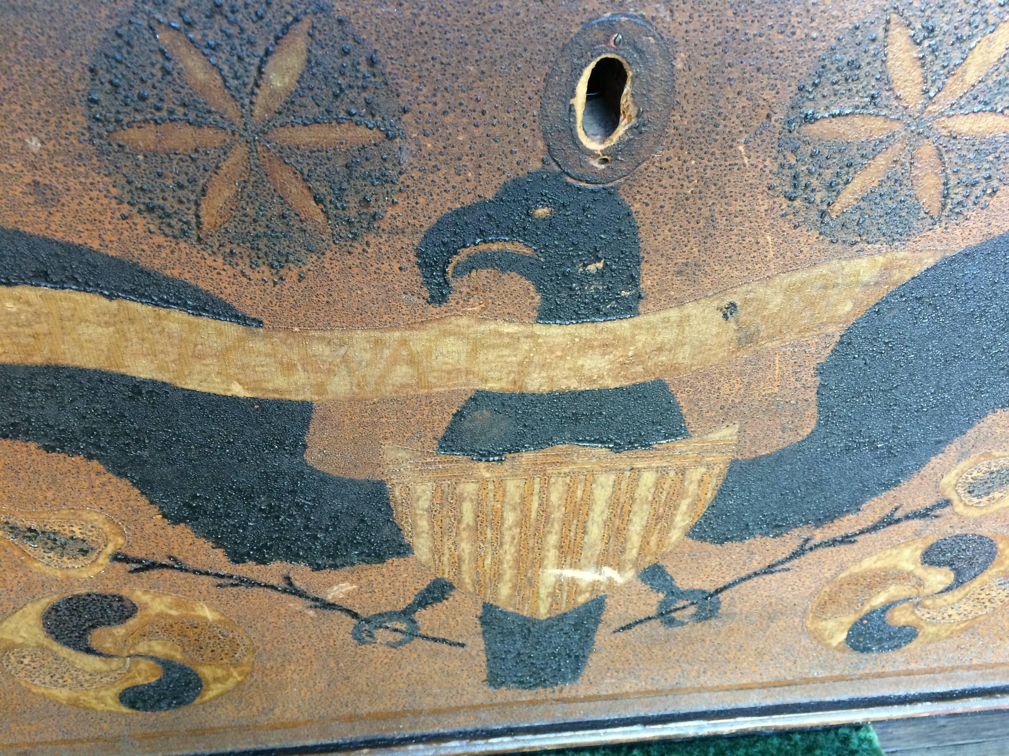 Part of a distinct group of “Eagle” chest found in Centre county, Pennsylvania, this example was made for “Margrate Wagener” (Margaret Wagner) and is dated “1817” inscribed on a banner between the eagle’s wings. The eagle is encircled with hex