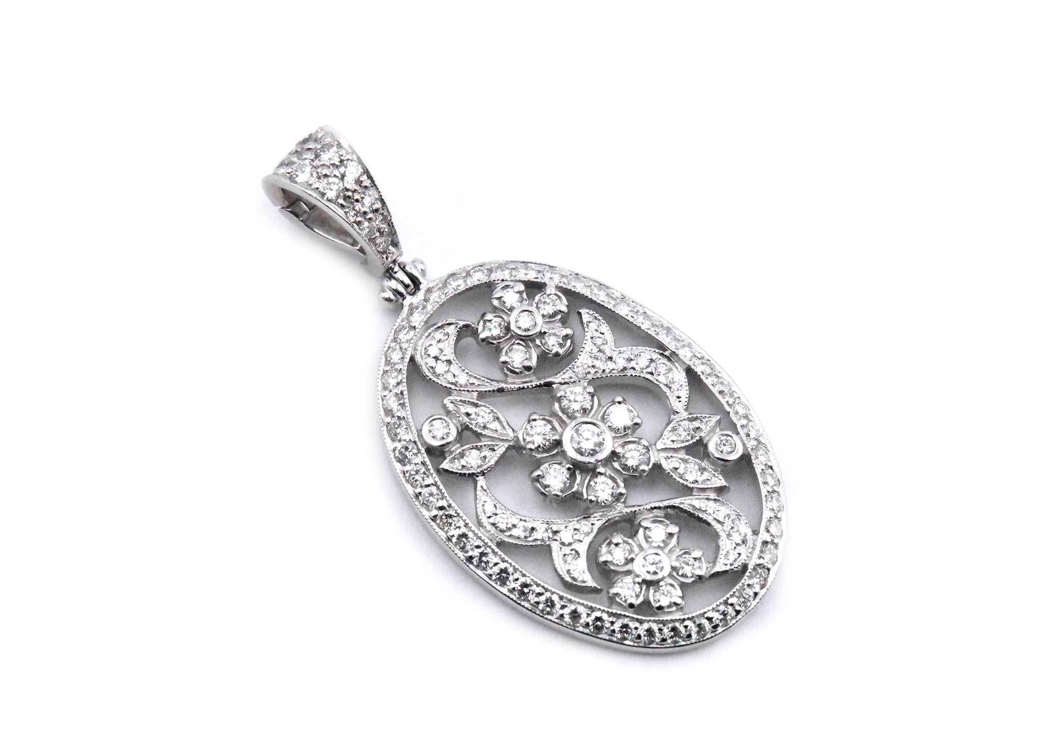 Designer: Penny Preville
Material: 18k white gold
Diamonds: 1.54cttw round cut 
Color: G
Clarity: SI1
Dimensions: Pendant measures 43.75 X 22.15mm
Weight: 8.89 grams