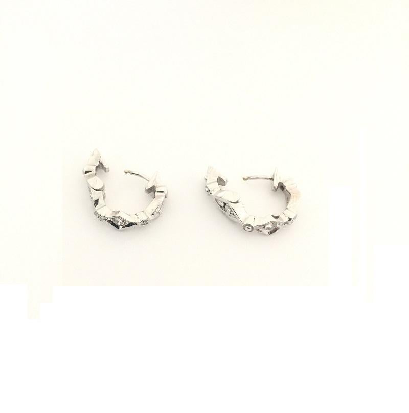 Boucle d'oreille en diamant pour femme Penny Preville 
or blanc 18k 
Diamant d'un poids total de 0,86 carat 
ER1179W