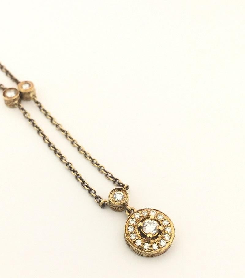 Penny Preville Ladies Diamond Necklace 
18k Yellow Gold 
Diamond 0.47 carat total weight with 3 bezel set diamond on the chain 
Chain 16